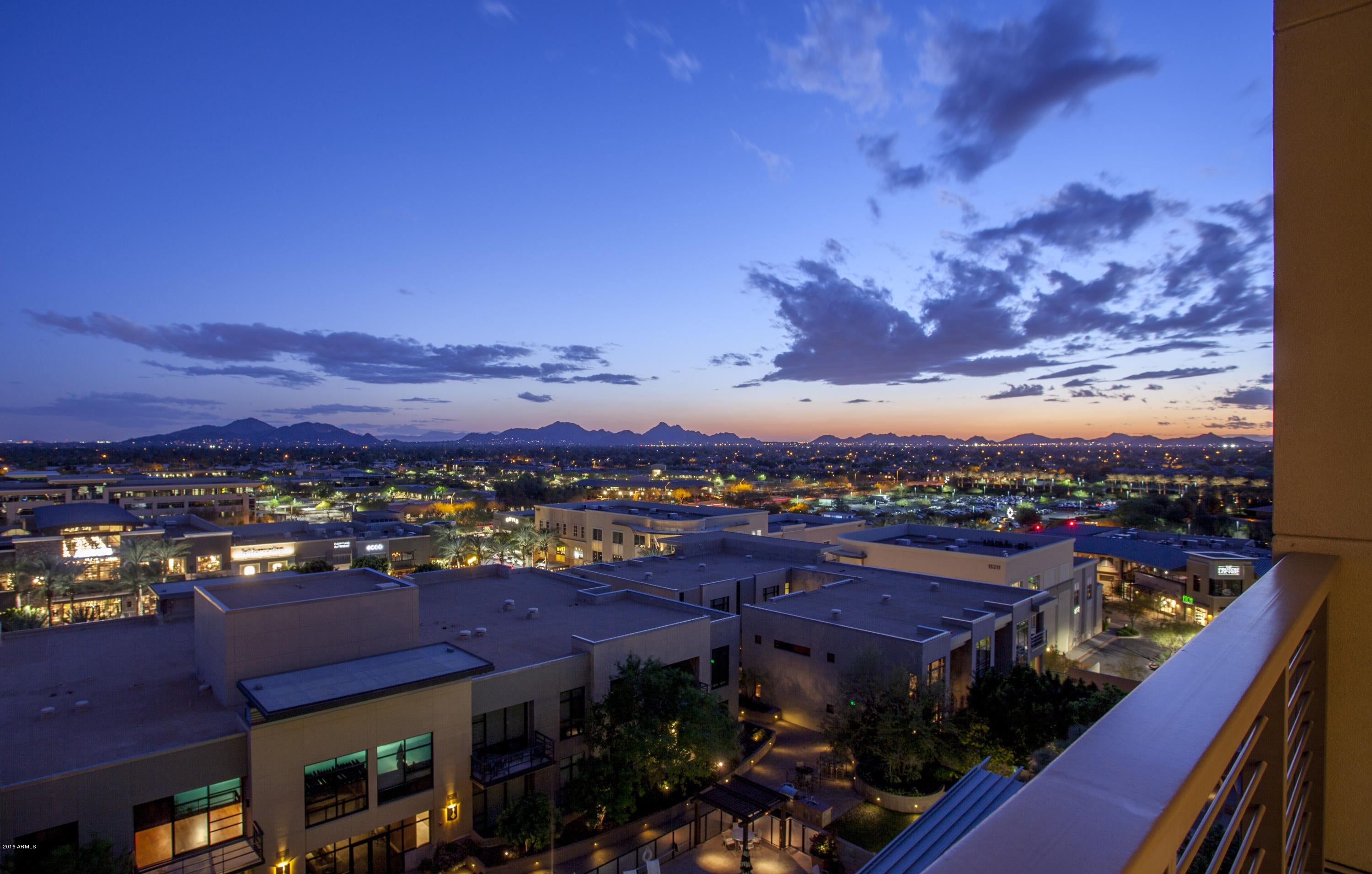 ORIGINAL OWNER!!!...SWEEPING UNOBSTRUCTED VIEWS looking SOUTH to the Valley from this PREMIUM LOCATION on the 8TH FLOOR of the 9 STORY residential building located in KIERLAND COMMONS - THE PLAZA LOFTS TOWER!! AMAZING CITY LIGHTS AND MOUNTAIN VIEWS  up to 70 miles away!!!  NEWLY REMODELED LAST YEAR Think about it...in ALL OF NORTH SCOTTSDALE, Only a HANDFUL of homeowners will have views like this!!  AND.....No details were spared on this One-of-A-Kind Loft that also overlooks the pool and both sundecks.  The Owner's Suite has a spacious sitting area, and expansive glass. Live above the shops and restaurants in Kierland Commons!! This is LIFESTYLE LIVING at it's best with Kierland Commons, Scottsdale Quarter and the neighboring Kierland Resort and Spa and 27 hole Kierland Golf Course across the street. Simplify your lifestyle, and enjoy all the amenities a luxury home can offer without the maintenance....have the freedom to lock and leave. The Scottsdale airport is 3 minutes away and Phoenix Sky Harbor is only 20 minutes. Walk to more than 35 restaurants in Kierland Commons and the Scottsdale Quarter and shop at more than 100 retailers! Rounding out the list of selling features are many community amenities, including on-site concierge staff and property management, a private fitness studio, 2 community lounges (both with catering kitchens), 2 resort-style sundecks, heated lap pool, grilling stations, pet park, reserved owner parking and guest parking in the private garage, and exclusive VIP discounts on shopping and dining throughout Kierland Commons and Scottsdale Quarter and surrounding areas as well as special "OWNER" privileges at the neighboring Westin Kierland Resort and Spa and Kierland Golf Club. (SEE DOCUMENTS TAB for RESIDENTS DISCOUNTS at SHOPS, RESTAURANTS, WESTIN SPA/GOLF COURSE)