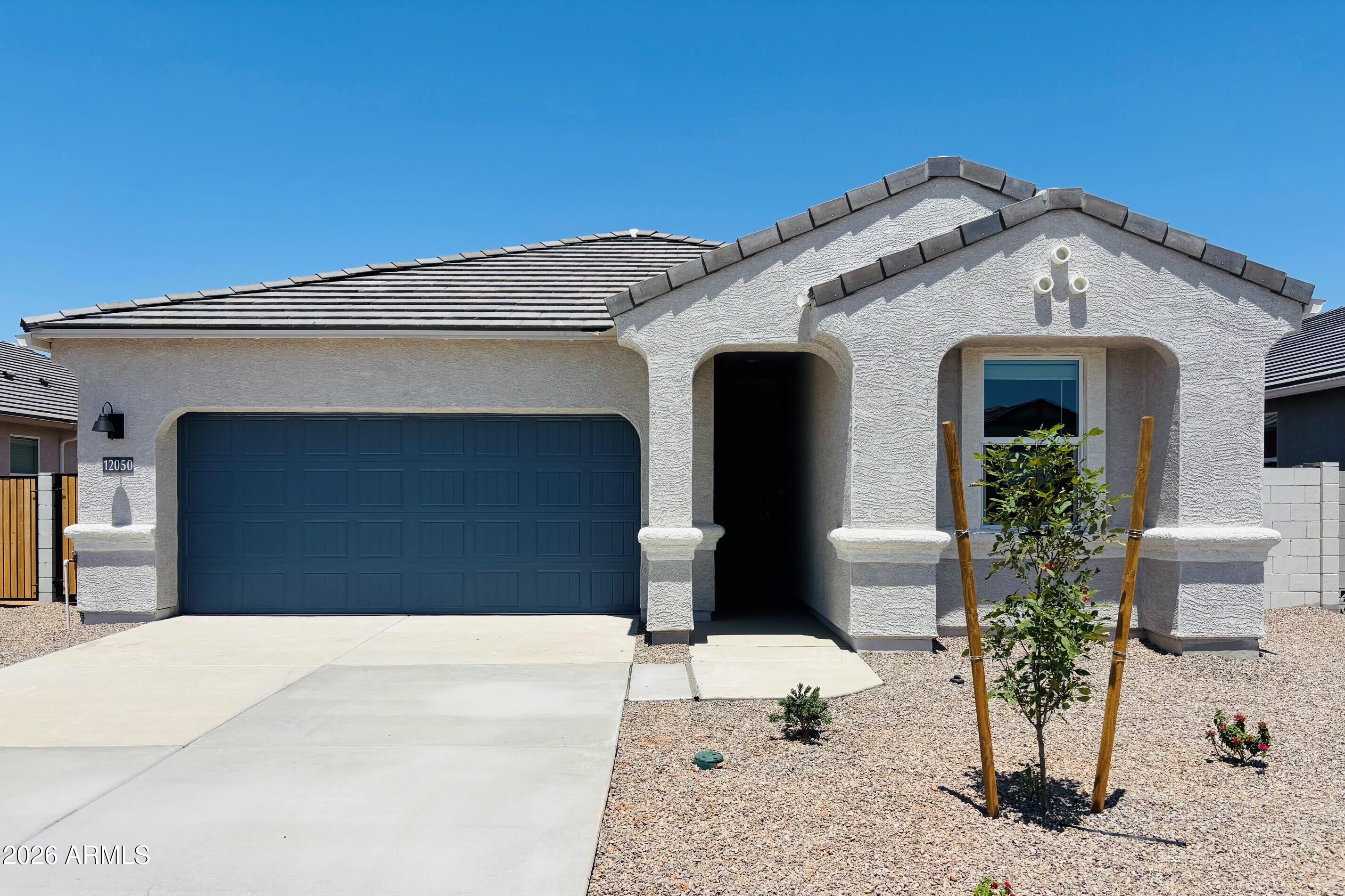 BRAND NEW | Home Ready Now! | No Back Neighbor Pool Sized Lot w/ a Double Gate | This fabulous, open concept home will leave your mind BLOWN! This sheer masterpiece features a split 4-bedroom layout, with unreal functionality. It just works! Interior finishes include granite kitchen & bathroom counter tops, espresso cabinets, and tile flooring throughout, except the bedrooms. Smart home technology is included along with a 14 seer HVAC and energy saving features like spray foam insulation. Also, this home includes stainless steel appliances, 220v pre-wire in the garage, 2'' window blinds, garage door opener, rain gutters, plus front yard desert landscape. Come see this home in the desert's most sought after hidden gem, Magma Ranch Vistas!