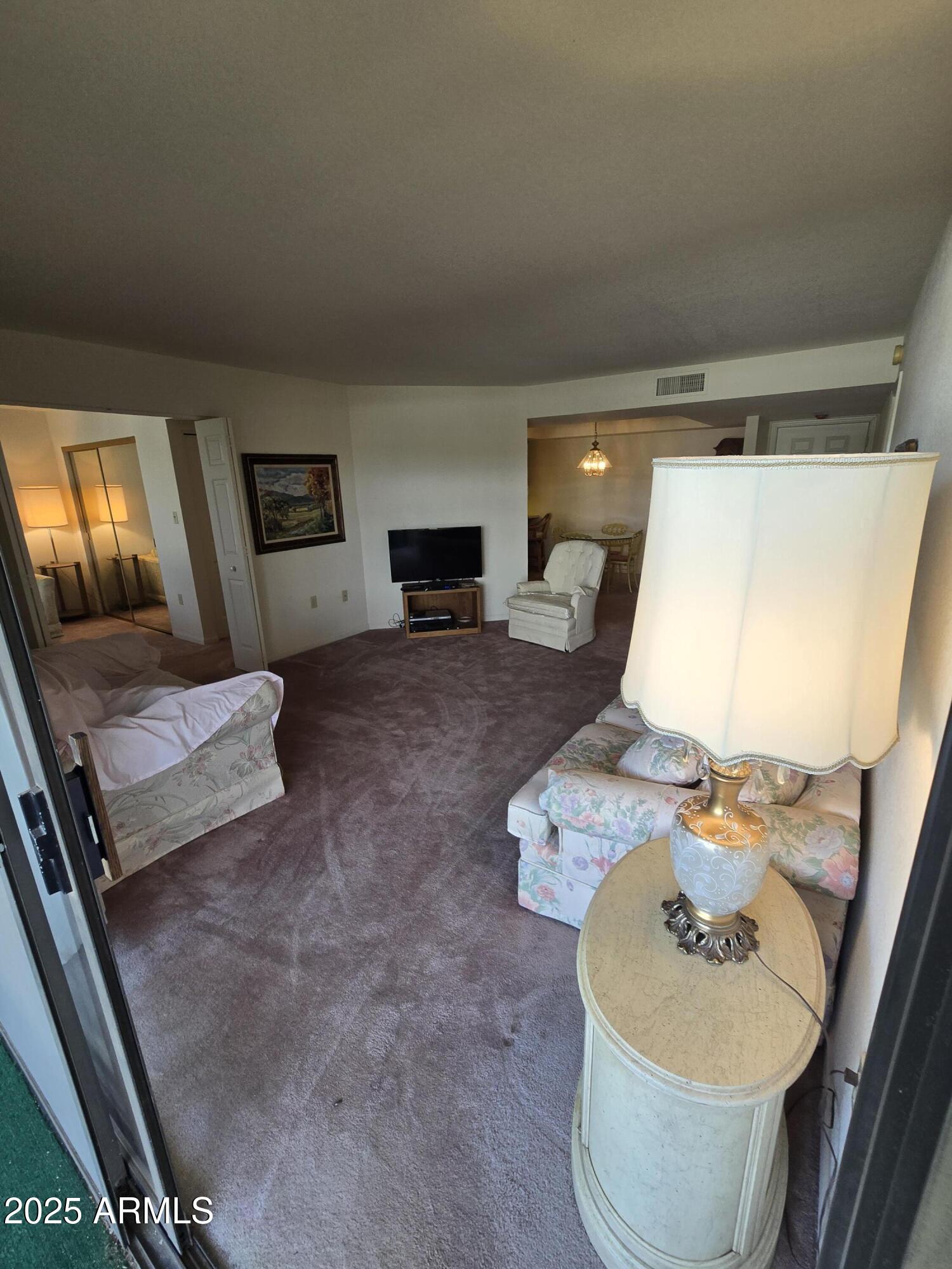 Welcome to The Heritage - Residential living at it's finest.  This 1109 sq, ft condo with  2 bedrooms, 2 bathroom is waiting for your personal touch.  Primary bedroom with walk-in closet. Located on the second floor close to elevator facing North with beautiful views to enjoy your morning coffee. Second bedroom can be used as a den. Close to elevator, drop shoot for your garbage, assigned parking with additional golf cart space. Shed attached to your parking area. Secure building with swimming pool, spa, fitness center, rec rooms, full kitchen to entertain your guest, Social events, nice courtyard. HOA pays for 100 cox cable channels. Check out Youtube: The Heritage-Sun City for more information about the complex.
