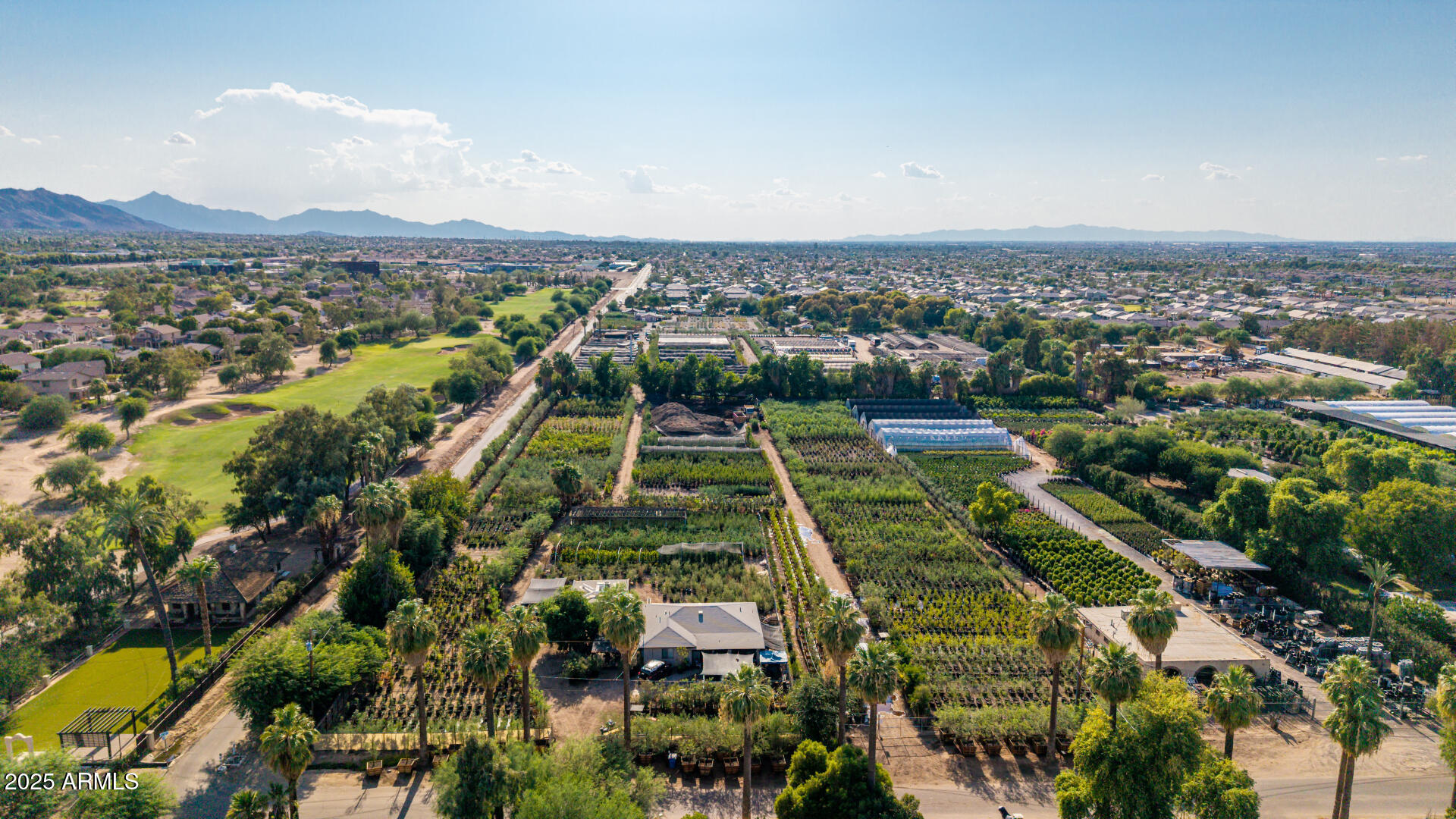 Seize a rare opportunity to own ±4.75 prime acres just a few miles south of Sky Harbor Airport, offering an exceptional blend of privacy, accessibility, and long-term potential. Located just north of Legacy Golf Resort's 1st and 18th fairways, this property includes two homes: the larger is 1,443 SF and the smaller is 770 SF. It is an irrigated, fully fenced, rectangular parcel which enjoys a quiet, secluded setting while being minutes from I-10, I-17, SR 143, Downtown Phoenix, Tempe, and Scottsdale. Currently leased to an established nursery through September/October 2027, with annual rent escalations, it provides immediate income and future upside. Surrounded by nurseries, single-family homes, and resort amenities, this property is ideal for continued nursery operations, residential... redevelopment, or mixed-use (buyer to verify zoning and uses with the City of Phoenix). Golf course adjacency adds prestige, while irrigation rights offer valuable water security. With Phoenix's strong population growth, limited central land inventory, and proximity to major economic hubs, the investment appeal is unmatched. Whether continuing current use, developing custom residences, or holding for appreciation, this is a rare infill opportunity in a fast-growing metro. Note: Plants, trees, irrigation systems, and piping are not included in the sale.