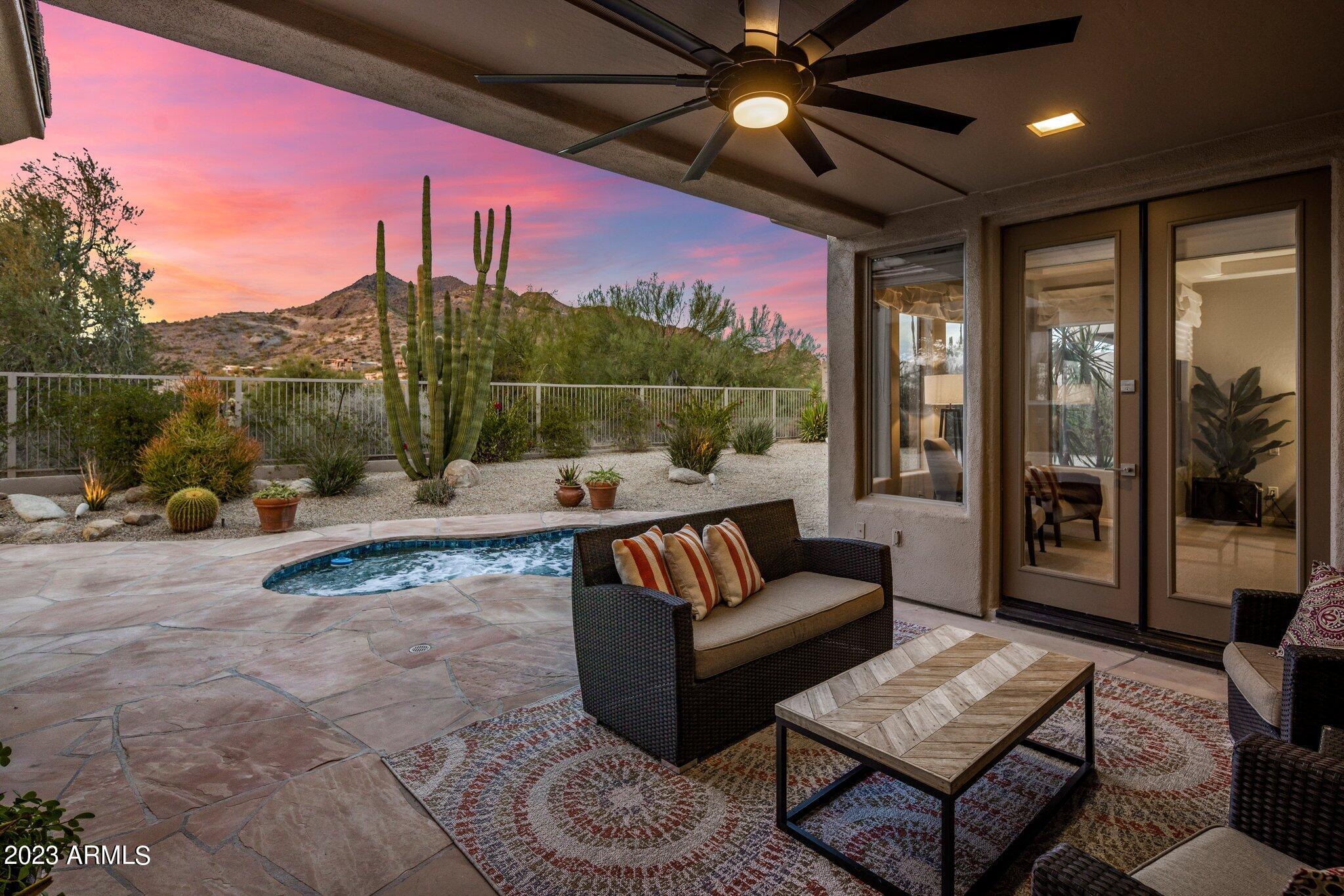 Very private 300 degrees Black Mountain and desert landscape views from both the exterior and interior of this impeccably-maintained Aurora model that backs to acres of lush Sonoran desert and has a NEWER ROOF AND TRANE HVAC SYSTEM AND HAS BEEN REMODELED IN SLEEK AND MINIMALIST DESIGN. This home boasts a contemporary style with clean lines, a minimalist aesthetic, and an open, clutter-free space that emphasizes simplicity and functionality. The Aurora is loved for its unique architectural appeal: Soaring 13' coffered ceilings, spacious master suite set quietly away from 2 guest bedrooms and den, eat-in island kitchen w/ built-in stainless steel refrigerator & wall ovens is wide open to the family room, 8' interior doors, LOTS OF ANGLES AND ART NICHES, clerestory windows, and 2 covered Features and Upgrades
Throughout
-Plantation Shutters
-New Paint Throughout, Including Garage
-Updated Hardware 
-Designer Light Fixtures
-Led Can Lights
-New Carpet In All Bedrooms
-Whole Home Stereo System
-New Italian Porcelain Tile Flooring In Kitchen And Living Room
-HVAC 2021 - 2 Units
-Roof Underlayment 2019
-R/O 2023
-Water Softener 2023

Den
-Custom Dry Bar And Wine Fridge

Kitchen
-New Quartz Waterfall Island
-New Sink And Fixture
-New Perimeter Granite Counter And Tile Backsplash
-Stainless Built In Fridge
-Gas Range
-Coffee Bar Nook With Floating Shelves
-New Dishwasher
-Refinished Cabinets
-Storage With Pullouts

Laundry
-Refinished Cabinets
-New Granite Countertop
-New Stainless Oversized Sink
-New Fixture
-New Designer Wallpaper

Primary Bedroom/Bath
-New Quartz Countertops
-New Sinks With Fixtures
-New Mirrors
-New Showerhead
-Freestanding Bathtub And Fixture
-Floating Shelves and Slat Wall Divide 
-Refinished And Raised Cabinets
-New Flooring Surrounding Bathtub
-New Carpet In Bedroom

Additional Bedrooms/Bath
-Custom Accent Wall In Second Bedroom
-New Quartz Countertops And Fixtures
-New Mirrors
-Refinished And Raised Cabinets
-Added Custom Tile With Inlay In Bath/Shower
-Powder Bath Added Designer Wallpaper, Mirror, And Fixtures

Family Room
-New Custom Fireplace Surround
-New Custom Window Coverings

Garage
-New Epoxy Floor
-New Garage Door Opener

Exterior
-New Stainless Steel Built-In BBQ
-New Large Patio Ceiling Fan
-New Pond Pump
-New Spool Filter And Case
Welcome to Terravita - Where Lifestyle is the True Luxury

Dear Prospective Homebuyer,

If you're considering making Terravita your home, know that you're not just buying a property; you're embracing a lifestyle that's rich, engaging, and brimming with opportunities. Terravita stands as a testament to a community that values experiences, relationships, and personal growth over mere bricks and mortar. Here, the house you buy is simply a gateway to the life you desire.

A visit to Terravita's clubhouse and a brief tour of the amenities is essential - it's not just recommended; it's crucial. It is literally what you are buying. If you are just looking for a house, this is likely not the place for you. Dialing 480-488-3456 can set you on a path to discovering a world where every day is a new adventure. This initial tour is more than just a walkthrough; it's an eye-opener to the vibrant, active lifestyle that awaits you. Many have said that understanding the depth and breadth of Terravita's amenities was a pivotal moment in their decision to join our community.

We invite you to take the first step towards discovering if Terravita is the right fit for you. It's not just about finding a home but finding a place where you can live your life to the fullest. The lifestyle you've dreamed of is here, waiting for you to embrace it. Remember, exploring Terravita starts with a tour of our clubhouse and amenities - make that call today and open the door to a world where life is rich, full, and wonderfully yours.


Terravita is a guard-gated 823-acre planned community with many resort-style amenities, including an 18-hole championship golf course, a 39,000 square foot newly remodeled clubhouse with two dining areas, a heated Olympic-sized pool and hot tub, six tennis courts and a full-time tennis pro, a 13,000 square foot health and fitness center, community-wide 6-mile long walking and jogging trails, and extensive event calendar with fun-filled events held by dozens of social organizations.

Terravita Golf and Country Club has been voted "Best Master Planned Community" and "Best Private Golf Club" numerous times by Ranking Arizona. Terravita was created by Del Webb and was its first non-age-restricted community. The golf course was created by PGA Hall of Fame member Billy Casper and designer Greg Nash. Terravita golf amenities include a pro shop, a large driving range, and four separate areas to practice chipping and putting.