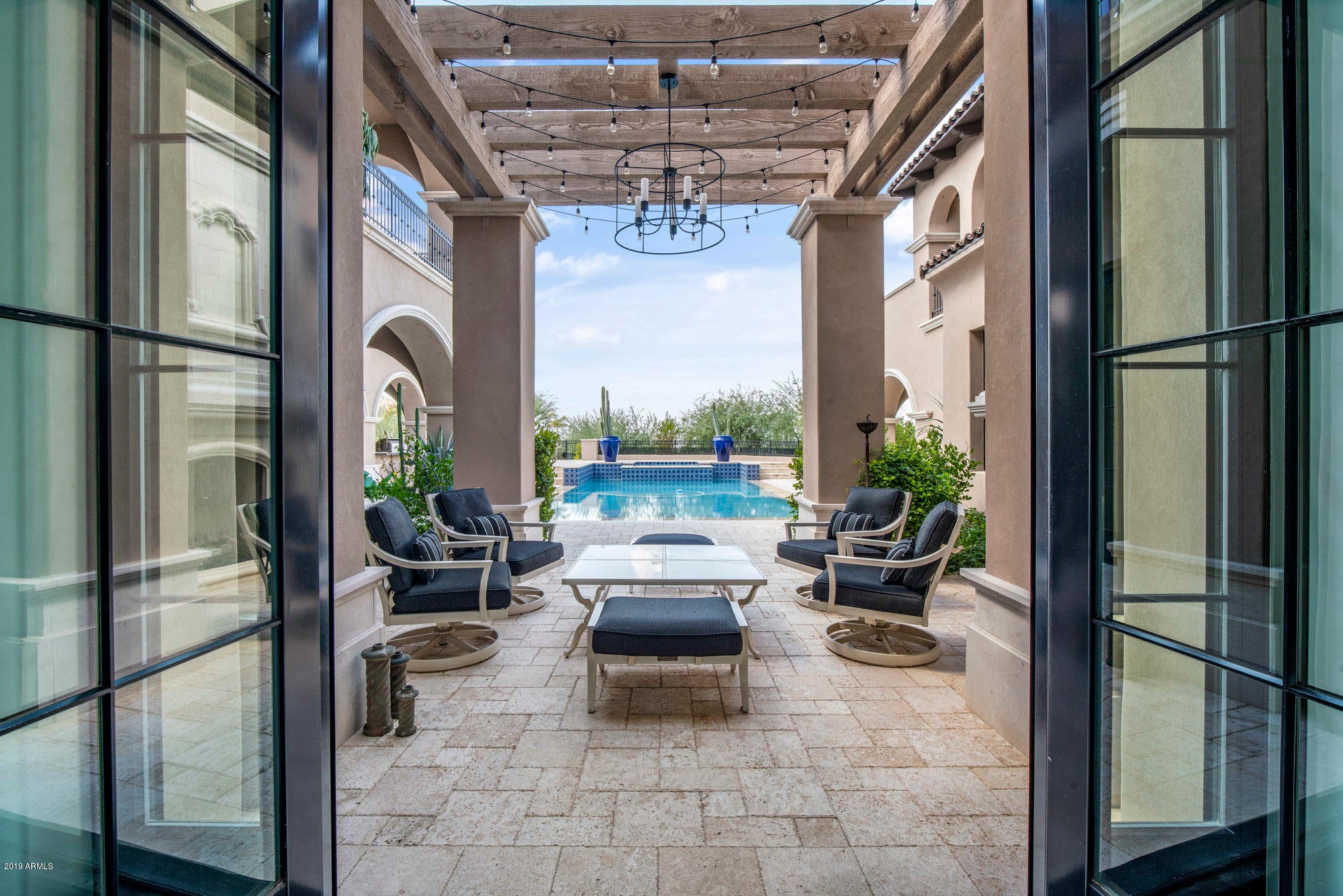 Uncompromised style, luxury and views in this estate at Silverleaf in the upper canyon.  You won't be looking over anyone else's rooftops with these unobstructed panoramic views of the golf course , mountains and city lights from the  multiple patios and outdoor living. This modern 2016 built estate offers 6 bedrooms 7 full bathrooms (includes full pool bath) ,2 half baths, and  a detached guest house with a one car garage.  No detail has been overlooked -office with mezzanine library, 900 bottle wine room, view decks from EVERY room elevator, dog wash, wolf appliances, dual island kitchen,  bar with stainless steel counter top, 4 laundry areas, custom wood built-ins. Enjoy outdoor living with kitchen, heated and cooled patios, outdoor shower, multiple fireplaces, pergola, heated pool/spa.