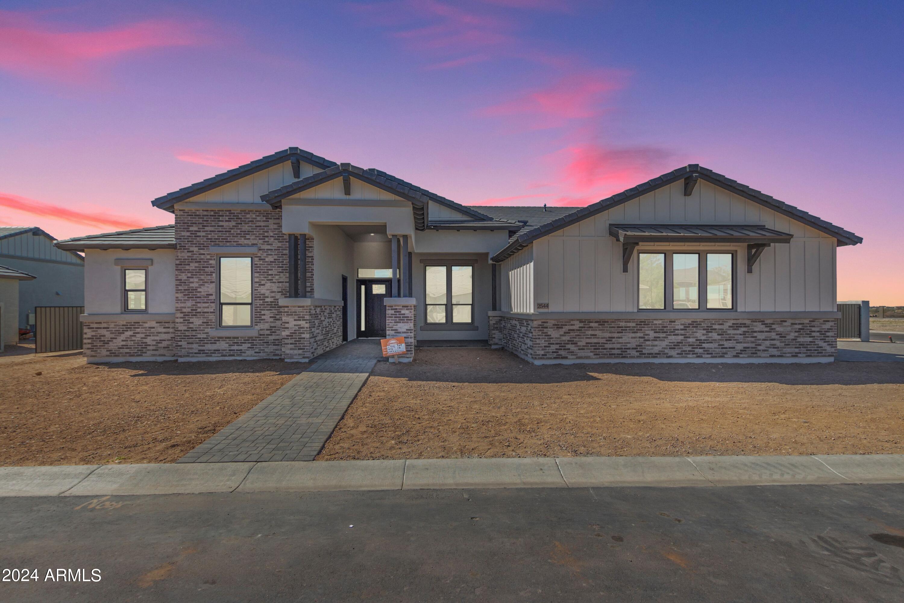 This NEW, semi-custom home in the private gated community: Overlook at Forest Knoll features an oversized corner lot, guest quarters with separate entrance, 5 beds 4.5 baths plus den. This property is a rare gem with included features such as: 12' flat ceilings at living room, 10'flat ceilings at bedrooms, 72'' LED fireplace, 5'' baseboards throughout, 8' shaker style interior doors, smooth 80/20 drywall texture, deluxe closet system at primary closet with laundry access. Spacious kitchen includes double stack cabinets, quartz counter, soft close cabinet doors & drawers, 48'' commercial dual-fuel range, 2 KitchenAid dishwashers, KitchenAid Microwave drawer, & Ice Maker, 48'' Canopy hood The luxurious primary bath is complete with spacious shower with dual shower heads, free-standing Kohler tub, executive height vanities, square under-mount sinks, Moen faucets & accessories and oversize linen closet. All secondary baths have beautiful tile tub/shower surrounds and include designer selected finishes.
In addition to the countless interior features, this home boasts an oversize 3 car garage, mounted garage door openers and 8' tall garage doors. The RV gate leads to the spacious side yard. The 16' slider in the great room leads to travertine back porch and huge backyard. The attention to detail in every space of this home is phenomenal.