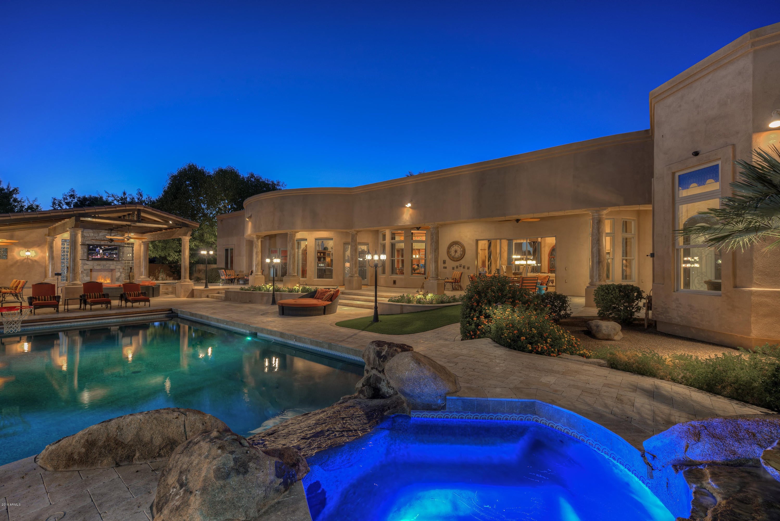 New Photos! 6160 sq ft home with 6 bedrooms and 4.5 bathrooms (including a large guest ensuite with separate entrance).  Combines European refinement with casual elegance. Home features a theatre room, office, gourmet kitchen with cherry wood cabinets, SS appliances, granite countertops, 2 large pantries, formal dining room, great room, family room, 12' ceilings, Three Control 4 Media Stations with built-in speakers and an extra-large 3 car garage with built-in cabinets.  Backyard boasts a resort-like retreat with a large covered patio, large sparkling salt water pebbletec pool, separate spa, 34'x24' gazebo with a gourmet kitchen & dining/sitting area, putting green and golf driving area.  Several water features in the front and backyards.  If you like to entertain, this home is for you!
