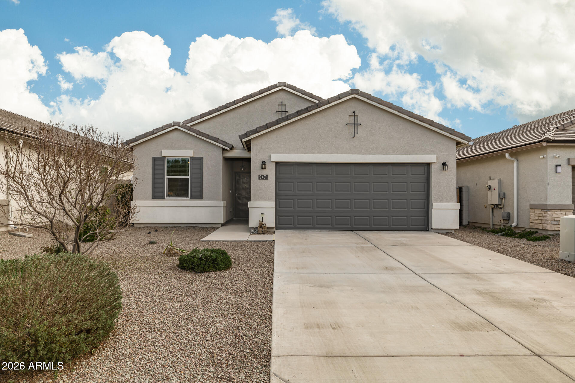 Beautiful Crestfield Manor residence offering 3 bedrooms, 2 bathrooms & a 2 car garage with great curb appeal & a fully landscaped beautiful backyard. Upgraded extended tile flooring in the main living areas & soft carpet in the bedrooms. The open concept layout is perfect for everyday living & entertaining. The kitchen shines with stainless steel appliances, granite countertops, tile backsplash, espresso cabinets with crown molding, recessed lighting, pantry & large island with breakfast bar. The spacious primary suite includes dual sinks, a fully remodeled shower with glass enclosure, custom barn door & an oversized walk in closet. Blinds & ceiling fans are installed throughout, along with a new kitchen faucet & toilets. The garage features epoxy floors & a water softener. Step outside to an amazing low maintenance backyard with a covered patio, custom pergola, over $13,000 in pavers, fire pit, & plenty of space to relax or host guests. Added highlights include solar panels for energy savings, a beautiful front security door, & Everlights exterior lighting. This home truly offers comfort, style, & pride of ownership inside & out.