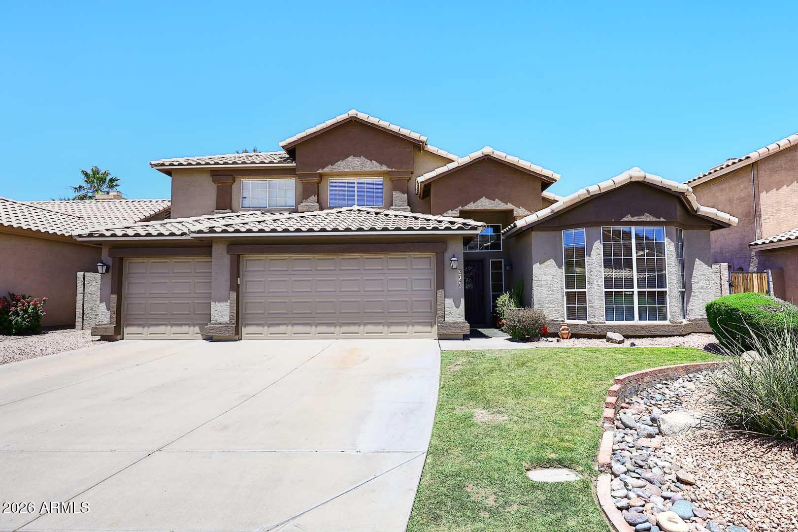 Surrounded by stunning mountain views in Mountain Park Ranch of Ahwatukee, this spacious home offers over 3,000 square feet with 5 large bedrooms and 2.5 baths. Formal living and dining rooms provide elegant entertaining space, while the open kitchen and breakfast room overlook the inviting family room featuring a beautiful stone fireplace. The primary suite is conveniently located on the main floor. Recent updates include newer engineered wood flooring, newer roof, 2 newer AC units, newer exterior & interior paint, garage doors, epoxy garage floor, variable speed pool pump, water heater, water softener, EV charger, and tinted north-facing windows. Step outside to your private backyard oasis featuring a sparkling play pool perfect for summer fun and relaxation, all surrounded by breathtaking mountain scenery. Ideally located near hiking, biking and walking paths, the incredible amenities of Mountain Park Ranch, restaurants, entertainment, and conveniently located near the 202, I-10 freeways. Located within the highly sought-after Kyrene School District and top-rated Desert Vista High School boundaries. Welcome Home!