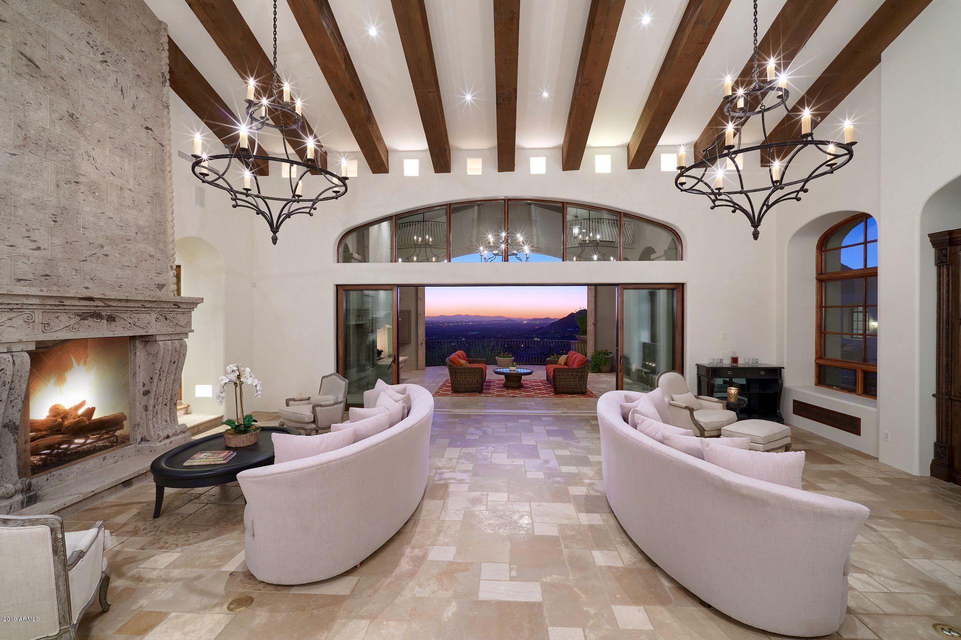 SELLER MOTIVATED! Perched at the top of Upper Canyon in Silverleaf this Lee Hutchison custom designed home with mesmerizing views is an entertainer's delight with both indoor and outdoor al-fresco living. Upstairs includes 3 guest en-suites and library/study. Large two bedroom en-suite guest casita and multiple courtyards. Detached private office w fireplace & stunning views is just some of the many highlights. Unobstructed breathtaking views from every room, privacy, and the most desired lot in Silverleaf makes this home unequaled and in a class by itself.