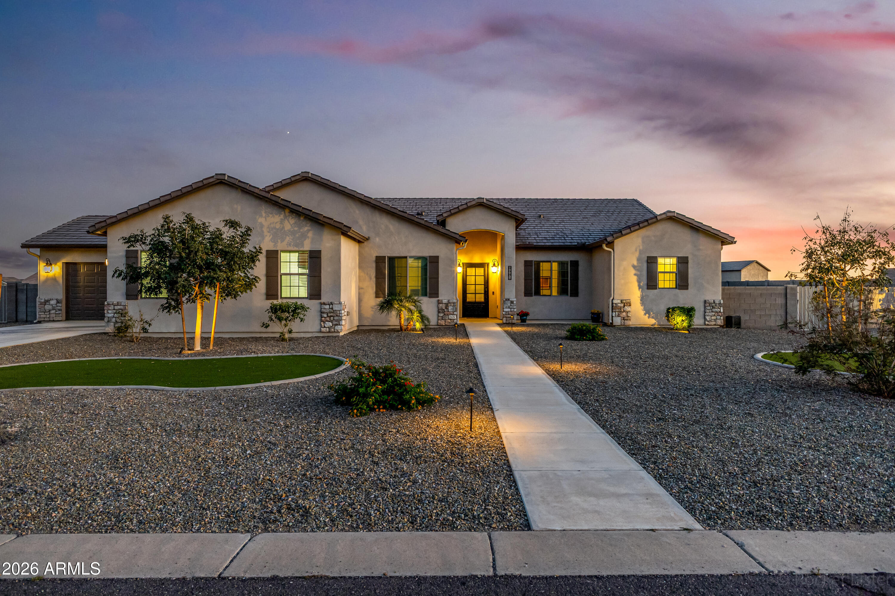 Beautiful, pristine, gently lived-in home on a 1-acre lot with stunning mountain views! This semi-custom 4BD/2.5BA home in Arroyo Verde Estates features soaring ceilings, a neutral palette, and an open floor plan designed for comfortable living and entertaining. Gourmet kitchen offers quartz countertops, stainless steel appliances, crown-molded soft-close cabinetry, tile backsplash, walk-in pantry, and a large prep island with breakfast bar. Spacious primary retreat with outdoor access, dual sinks, and walk-in closet. Enjoy tile flooring throughout, tons of storage, decorative lighting, and laundry with doggie wash. Exterior highlights include a 4-car extended garage with pass-thru, RV gate, block fencing, covered patio, pool & spa, and expansive backyard awaiting your personal touch. Low-maintenance front yard. Just 1 mile from I-10 with room for RVs, boats & toys!