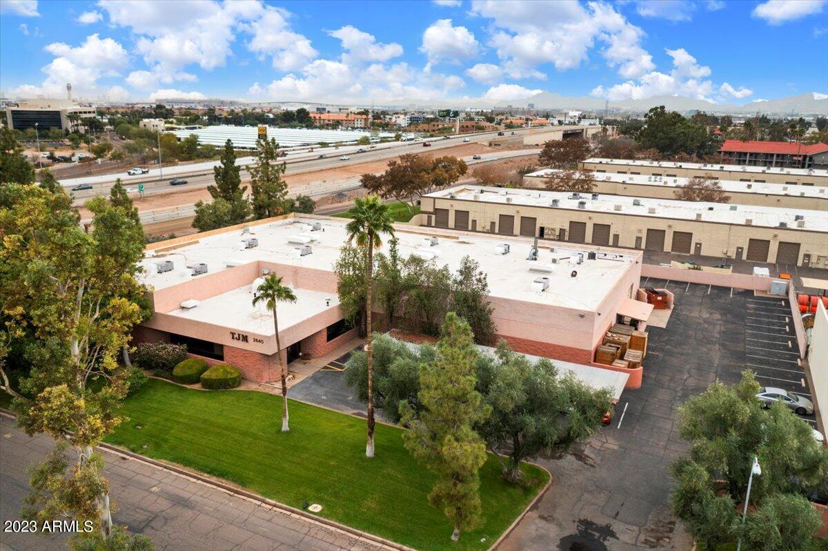 Over 21,000 SF, fully air conditioned production - flex space with additional uses including distribution, manufacturing, laboratory and office. Current building layout is perfect for one owner-user or tenant or potential multi-tenant occupancy. 53 parking spaces including 9 covered. Two 12' overhead doors. Two 400 amp panels service. Clean Room. Situated on 1.36+AC and ideally located less than 1 mile to the I-10 and 143 Freeways, 2 miles to the 202 Fwy and Sky Harbor Airport, 3 miles to ASU and 10 minutes to downtown Phoenix. Excellent highway exposure with monument signage already in place. Please do not disturb tenants. Floorplan in ''Documents'' tab.