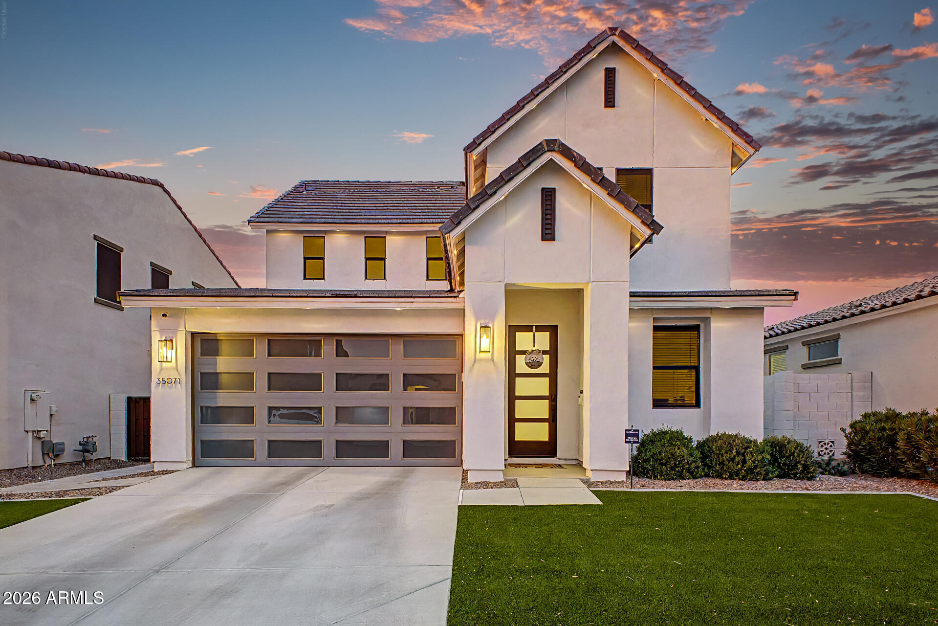 Discover elevated living in this beautifully upgraded 3 bed 2.5 bath home perfectly designed for resort style living. Step inside to an inviting open-concept layout enhanced with LVP flooring abundant natural light, pocket patio doors, reverse osmosis & 10 ft. kitchen island. The flexible den easily converts into a home office or 4th bedroom. The resort-styled backyard features a heated, salt water spa & pool with customizable lighting & serene waterfalls. The covered patio features a built-in gas grill & mini fridge perfect for outdoor entertaining. Front & back yards feature low-maintenance landscaping including immaculate turf that stays lush & green year-round. With luxury finishes, amenities & flexible floor plan this home stands out as the perfect blend of sophistication & comfort.