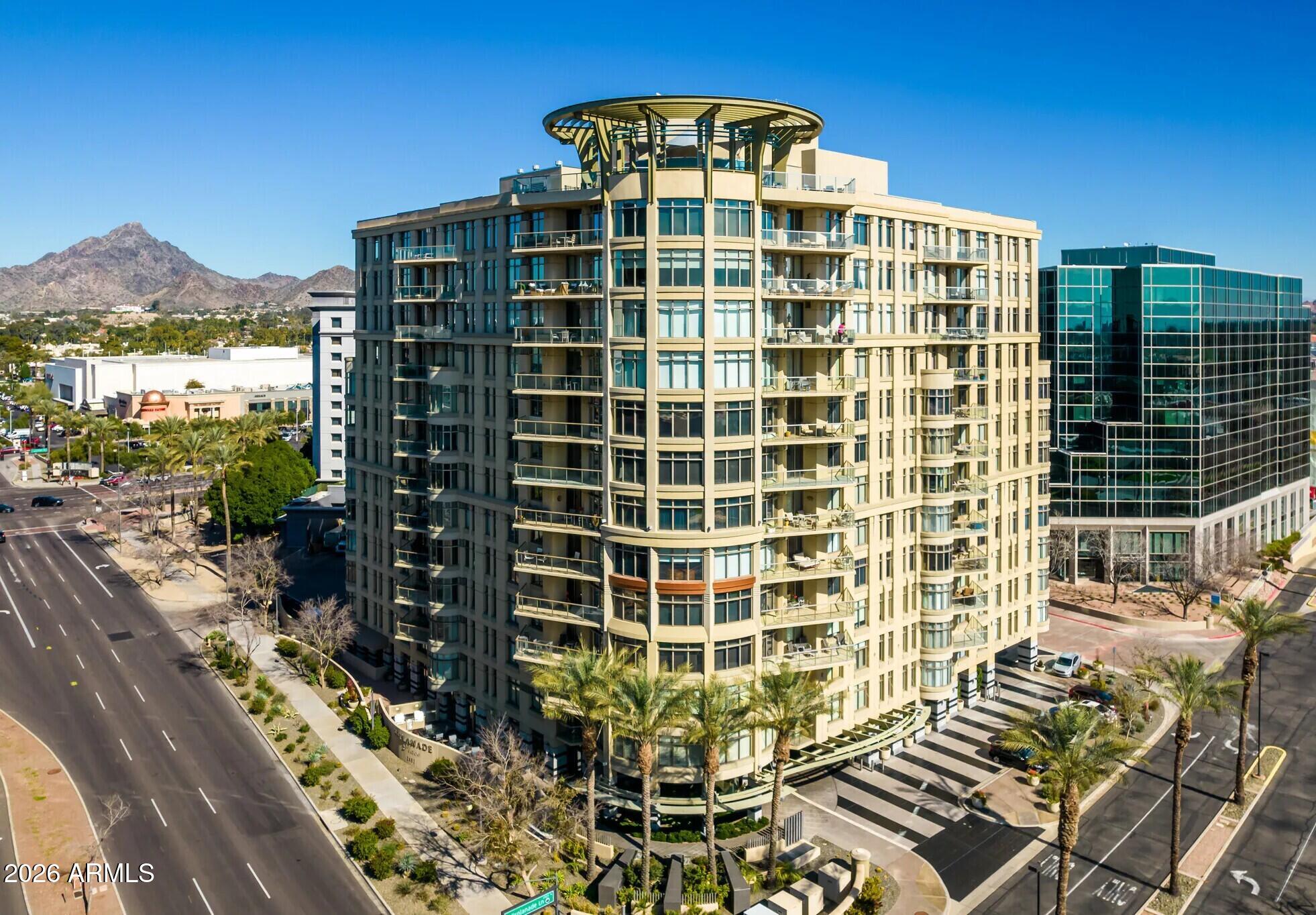 Experience the pinnacle of high-end condominium living at Esplanade Place Condominium, one of Phoenix's most exclusive residential communities. This prestigious building offers a full suite of resort-style amenities, including a state-of-the-art fitness center, elegant club room, 24/7 concierge and security, valet service, a stunning rooftop pool with panoramic views, and underground secured parking with two dedicated parking spaces plus a spacious private storage room. Situated on the 9th floor, this expansive residence spans approximately 3,000 square feet and showcases breathtaking views of Midtown Phoenix. The thoughtfully designed open floor plan is ideal for both everyday living and entertaining, featuring two generously sized bedroom suites, a dedicated office/den with custom built-in shelving, and a separate media room for relaxed evenings at home.

Located in the heart of the coveted Biltmore Area, residents enjoy immediate access to world-class shopping, acclaimed restaurants, vibrant bars, and all the lifestyle conveniences this iconic neighborhood is known for. This exceptional home combines space, privacy, luxury, and location--offering a truly elevated urban living experience.

****Please note that this unit is currently undergoing renovations due to a building drain issue and as such, there are no interior photos available at this time. This issue is being resolved by the building management and is the reason there is a special assessment on each unit.****
