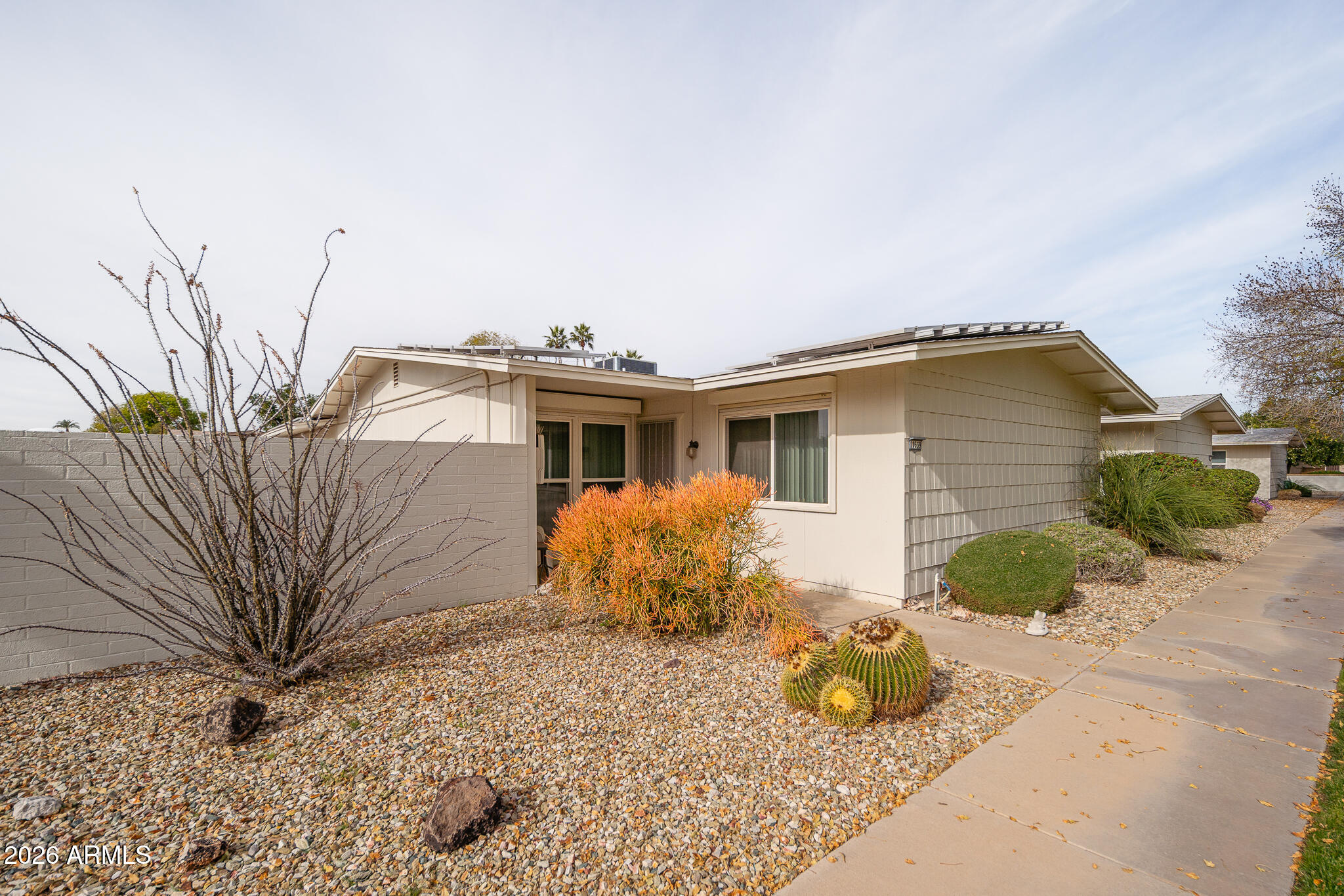 THIS 2 BEDROOM 2 BATH HOME IS READY FOR YOUR SPECIAL TOUCHES. WHEN YOU OPEN THE FRONT DOOR YOU SEE THE LAMINATE FLOORING WHICH IS THROUGHOUT THE HOME. THE LIVING ROOM AND DINING AREA COMBINATION ARE GREAT FOR ENTERTAINING. FROM THE DINING AREA YOU CAN ENTER THE FAMILY ROOM OR THE UPDATED KITCHEN. THE KITCHEN NOOK HAS VIEWS OF THE COVERED PATIO AND THE GRASS YOU DON'T HAVE TO MOW. THE FAMILY ROOM HAS A SLIDER OUT TO THE COVERED PATIO. THE MASTER BEDROOM HAS A WALK-IN CLOSET. YOU HAVE DIRECT ACCESS INTO THE HOME FROM THE 1.5 GARAGE. DON'T FORGET THER GUEST PARKING ON THE SOUTH SIDE OF THE HOME. THE SOLAR IS OWNED.