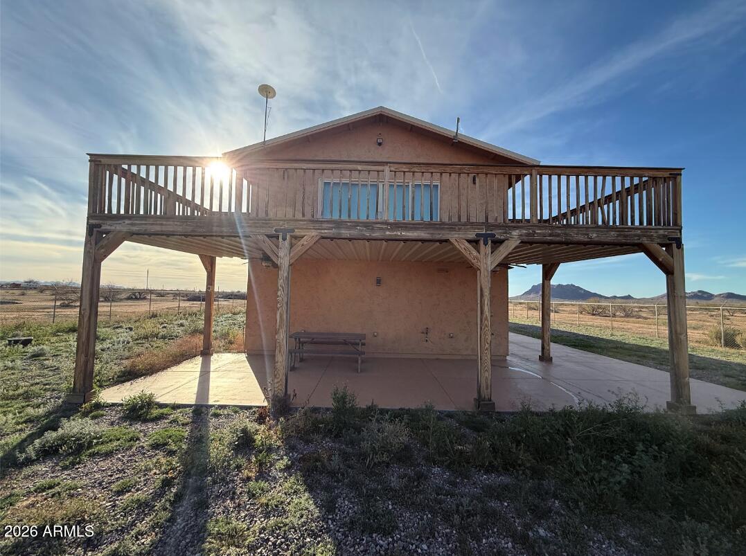Escape to this quiet, spacious Home surrounded by nature -- it's the kind of place you won't want to miss. Custom RV Port Home has Everything you need to enjoy Your Private Sanctuary on 13 Acres with Stunning views of the  Sawtooth Mountains. 
Home has, downstairs bedroom and bathroom, Covered Porch, Upstairs master suite &  Large Den leading to a full length deck. Home also has  attached garage and covered RV Area.  Propane stove and owned solar. 
Most furnishing are avaialbe including, furniture, dishes, appliances, lamps, television, etc. 
Relax and watch the skydivers or head out to nearby trails for hiking or riding. Privacy, space and a true rural desert feel.
No HOA! Enjoy quiet country living close to the I-10 halfway between Phoenix & Tucson. 
Buyer to verify all facts and f