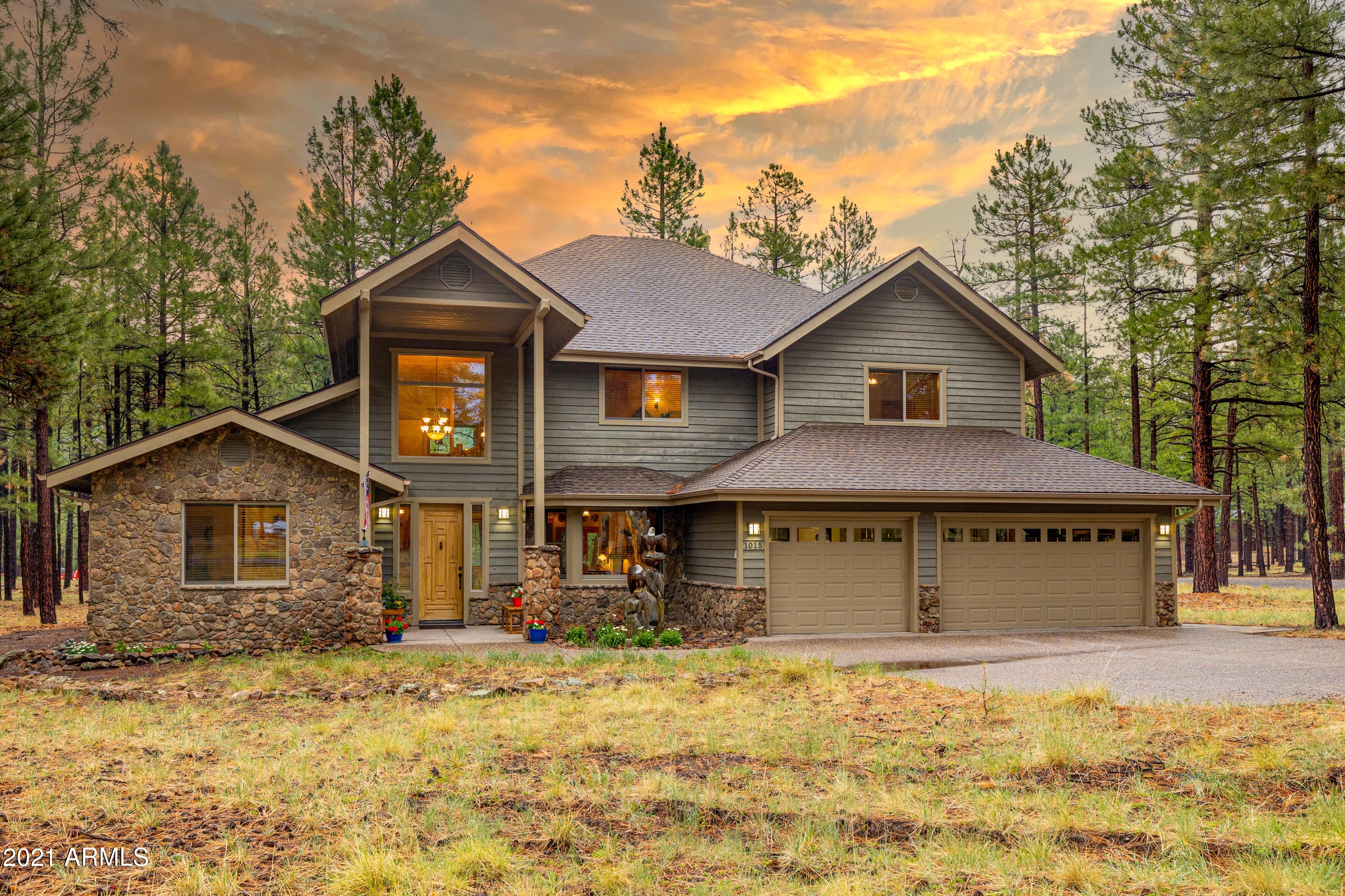 Nestled in the pines against the stunning backdrop of Mount Elden, this is a fabulous Lockett Ranches luxury home. Designed for family and entertaining, enjoy spacious rooms, soaring ceilings, custom log and stone accents and gorgeous natural light. On the main level, the kitchen, greatroom and primary bedroom look into the pines and Mount Elden. The office/den, which can be a 4th bedroom, makes working at home a pleasure. Upstairs, the large, open loft with log accents, a wetbar and views is the perfect second living & entertaining area. The tongue and groove wood ceilings create a warm and rustic luxury feel. Step outside and enjoy the beauty of your unobstructed views of the mountains. With a private well, radiant heat, central air, 3 car garage, & large, level lot, it's home. Nestled in the pines against the stunning backdrop of Mount Elden, this is a fabulous Lockett Ranches luxury home. Designed for family and entertaining, enjoy spacious rooms, soaring ceilings, custom log and stone accents and gorgeous natural light. On the main level, the kitchen, greatroom and primary bedroom look into the pines and Mount Elden. The office/den, which can be a 4th bedroom, makes working at home a pleasure. Upstairs, the large, open loft with log accents, a wetbar and views is the perfect second living & entertaining area. The tongue and groove wood ceilings create a warm and rustic luxury feel. Step outside and enjoy the beauty of your unobstructed views of the mountains. With a private well, radiant heat, central air, 3 car garage, & large, level lot, it's home.

See additional documents for all of the fabulous details of this home.