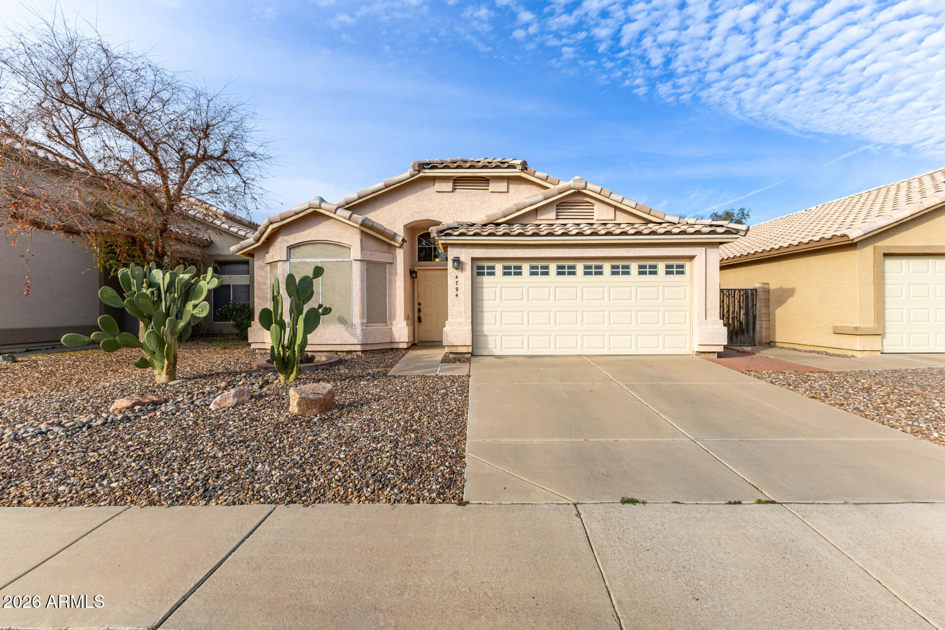 *Back on Market with New Flooring ** Charming 3 bed, 2 bath home tucked away on a Cul-da-Sac in this peaceful Chandler neighborhood. The bedrooms and living room feature plush NEW carpeting, New Flooring throughout for easy care and durability. The professionally upgraded Garage includes insulated walls and ceilings, an insulated garage door, bright LED lighting, a dedicated mini-split A/C unit, a 100-amp electrical panel, and multiple dedicated outlets throughout. A 50-amp outlet for EV charging is also included. New roof installed in 2019 and added insulation for maximum energy efficiency. The exterior features low-maintenance rock landscaping and an enclosed backyard with a privacy fence and patio. Convenient access to local schools, parks, shopping, dining, and major freeway