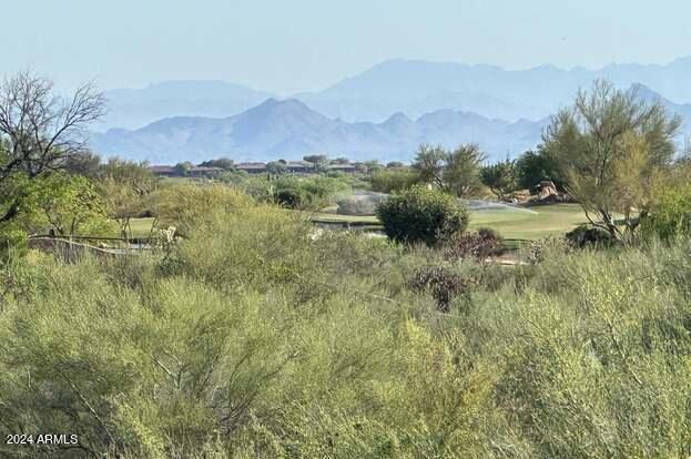 Nestled within the picturesque Desert Mountain community lies this captivating parcel spanning just under 7 acres. Featuring a generous building envelope of 30,925 square feet, this lot resides in the esteemed Villages of Lone Mountain. Should you desire even more space and opportunity, the adjacent lot is also available for purchase, offering a combined footprint of nearly 12 acres.