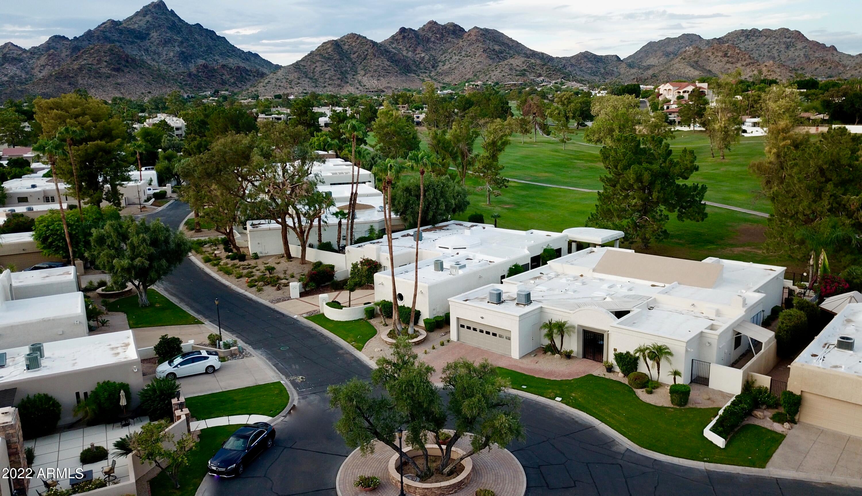 VERY RARE OPPORTUNITY TO OWN THIS  BILTMORE GOLF COURSE PROPERTY.  Homes almost never get listed in the Biltmore Gates subdivision. Easily one of the very best locations within this 24 hour monitored guard gated community.  It's situated on the 10th and 18th holes of the award winning Links Golf Course in the heart of the Biltmore. Beautiful pebble tec lap pool with AMAZING GOLF COURSE AND MOUNTAIN VIEWS.  Minutes from fantastic shopping, restaurants, the 51 freeway, and hiking trails. IT'S THE PERFECT LOCK AND LEAVE.  This home has been meticulously maintained and ready for you to make it your own.  Large master suite with a third bonus room that could be an office, an exercise room, or extra bedroom.  DEFINITELY AN OPPORTUNITY YOU DON'T WANT TO MISS.  Schedule a showing today!!!