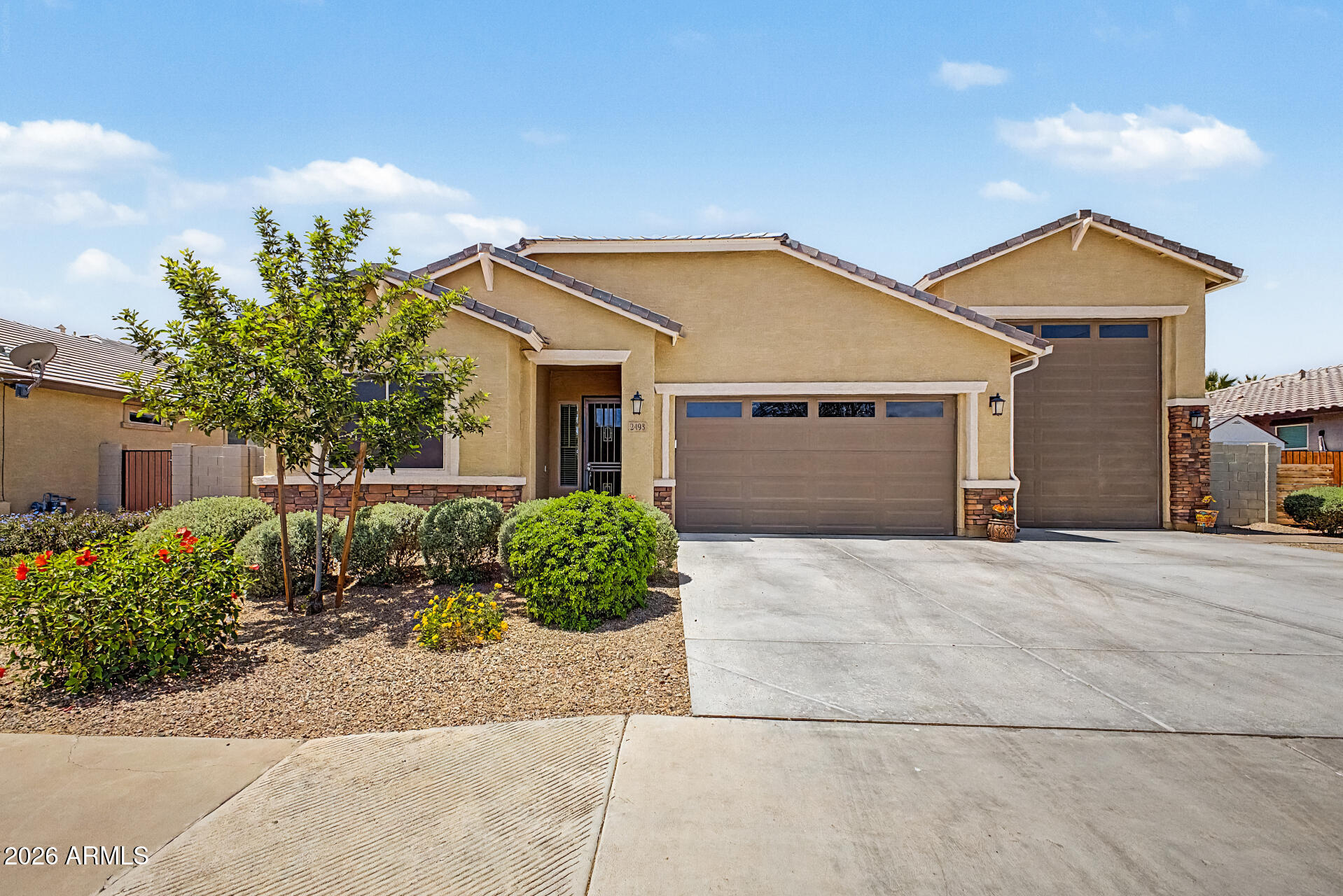Check out this gorgeous 4-bedroom home in McCartney Ranch! This gem features a 3-car tandem garage plus an RV garage! Inside, you'll find bright living spaces ready to bring you joy, with wood-look floors, contemporary lighting, and neutral paint that pairs well with any decor. The pristine kitchen boasts shaker cabinets, tile backsplash, quartz countertops, a walk-in pantry, SS appliances, and an island, perfect for entertaining. The main suite is a true retreat, including a practical walk-in closet for easy organization and a bathroom with dual sinks for added comfort. The screened-in patio is perfect for casual dining and relaxation. Out back, you'll have a covered patio perfect for weekend grills, pavers, artificial grass, and ample space for outdoor fun. Hurry up, this gem won't last! Email me for more detailed upgrade list.  Some of the upgrades include:  NEW PVC, 50 amp circuit for RV sewer drop, Cocktail fruit tree, screened in patio, under cabinet lights, Gas - 110 outlets, sink in garage, 3 zones, Sun Shield 90% UV top grade, gutters, 8 foot doors, 10 ft. ceilings, tandem garage, RV garage 48 x 14, gas stubbed on patio.