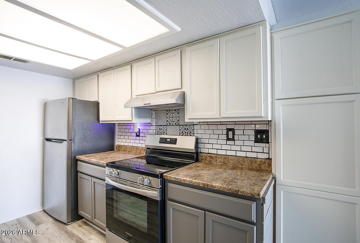 Gorgeous remodeled condo with tons of on-trend features catering to both comfort and functionality. This unit has one of the best locations in the complex and offers extra added privacy! As you enter you are greeted by a spacious open great room with a slider to the large balcony equipped with a brand new composite deck, storage closet and view of the Phoenix Mountain Preserve. The eat-in chef's kitchen is newly updated with BRAND new stainless Frigidaire appliances, freshly painted cabinets, new subway tile backsplash, new sink, tons of counter space, and a storage panty. The newer water heater and AC unit ensure maximum efficiency for low energy costs! The large primary suite has a walk-in closet and an en-suite full bathroom with a shower/tub combo.