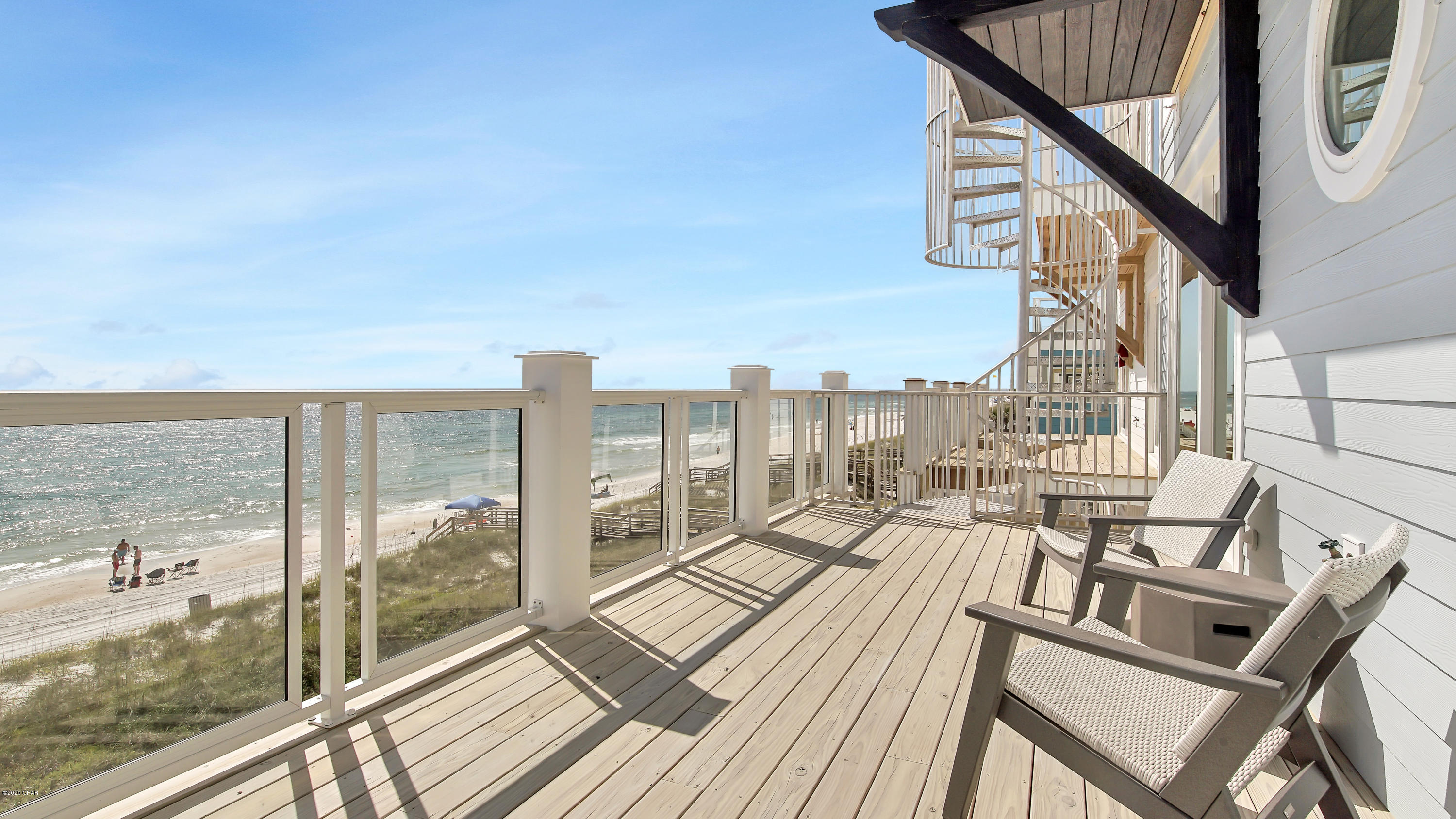 Welcome to ''Soul Surfer''!  This Soulful beachside retreat offers the ultimate in relaxation and fun.  Imagine coming right off the beach and taking a fresh water dip in your private pool, or swinging the afternoon away on your full-size poolside bed swing.  The bottom level of the home offers a kitchenette for conveniently grabbing a snack or ice cold beverage, along with a game room complete with arcade style basketball, a foos ball table and full size pool table! second floor which features the main living room, dining room and kitchen area complete with a furnished walkout balcony that offers pristine views of the Emerald Coastline. The 2nd floor features the main living, dining and kitchen area offering pristine views of the Emerald Coastline. You will love the 4th floor open loft area and adjacent large room with again multiple sleeping options and ensuite bath. On the beachside of the 4th floor you will find the main King master suite complete with an indoor sitting area as well as a walkout balcony.  All floors are connected by an elevator.  Pool is heated for your winter enjoyment.  This one has it all.......Call for your tour today!