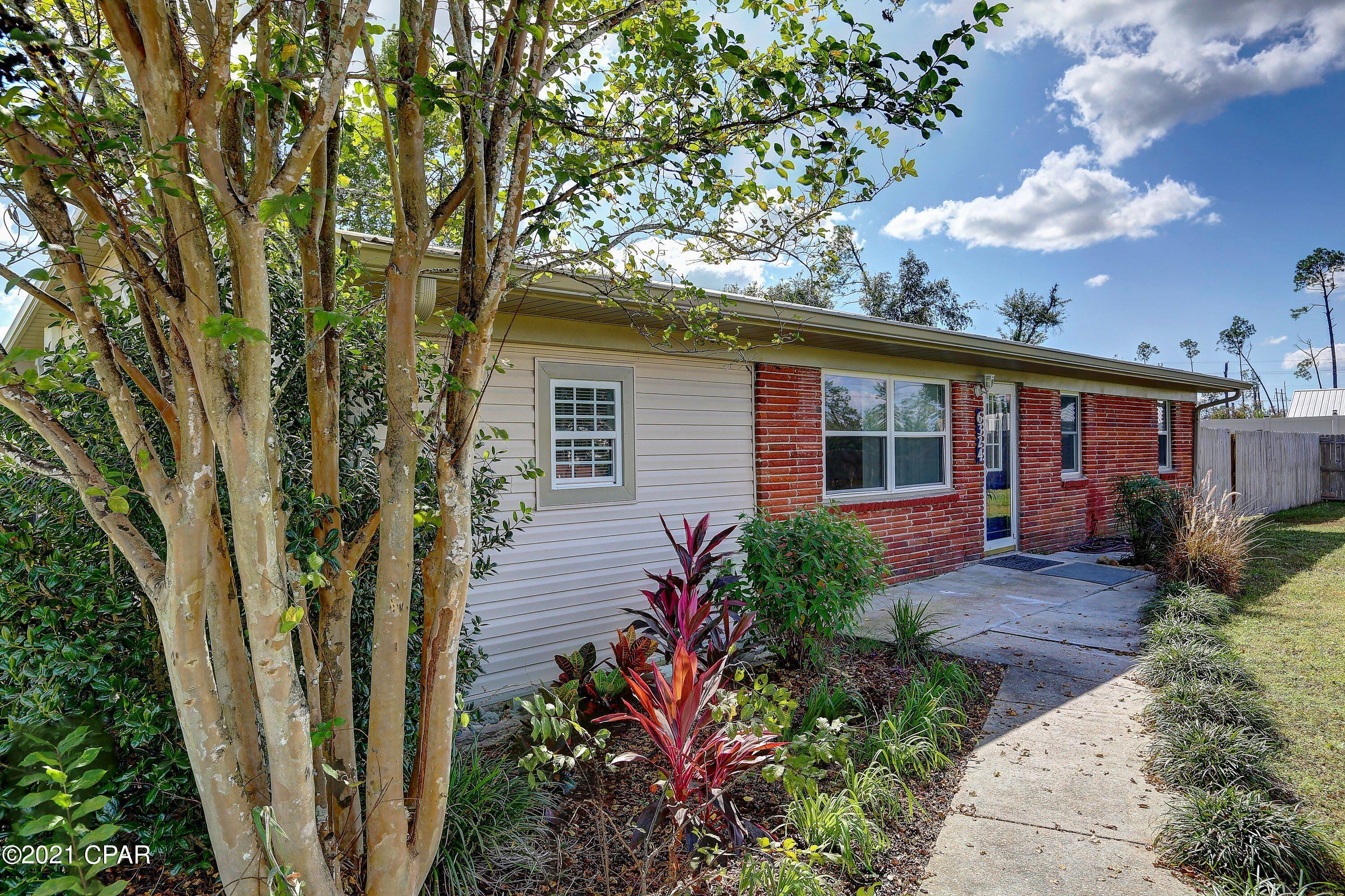 'CURRENTLY UNDER CONTRACT, SELLER ACCEPTING BACKUP OFFERS' Nestled away off Hwy 2301 on a quiet street & conveniently located close to Hwy 231, this remodeled 3 bedroom & 2 bathroom home boasts NEW Tesla battery powered SunPro solar panels that are less than a year old & located on the back side of the roof! You can live solar or stay connected to Gulf Coast Co Op. The owner paid 75k for these solar panels & they will be paid off at closing. The home offers an updated kitchen, plenty of closet space, a generous sized dining/living area, & a large yard. The A/C unit is newer, new hot water heater, new metal roof, a spacious yard with a 6 foot privacy fence, beautiful landscaping, & so much more!