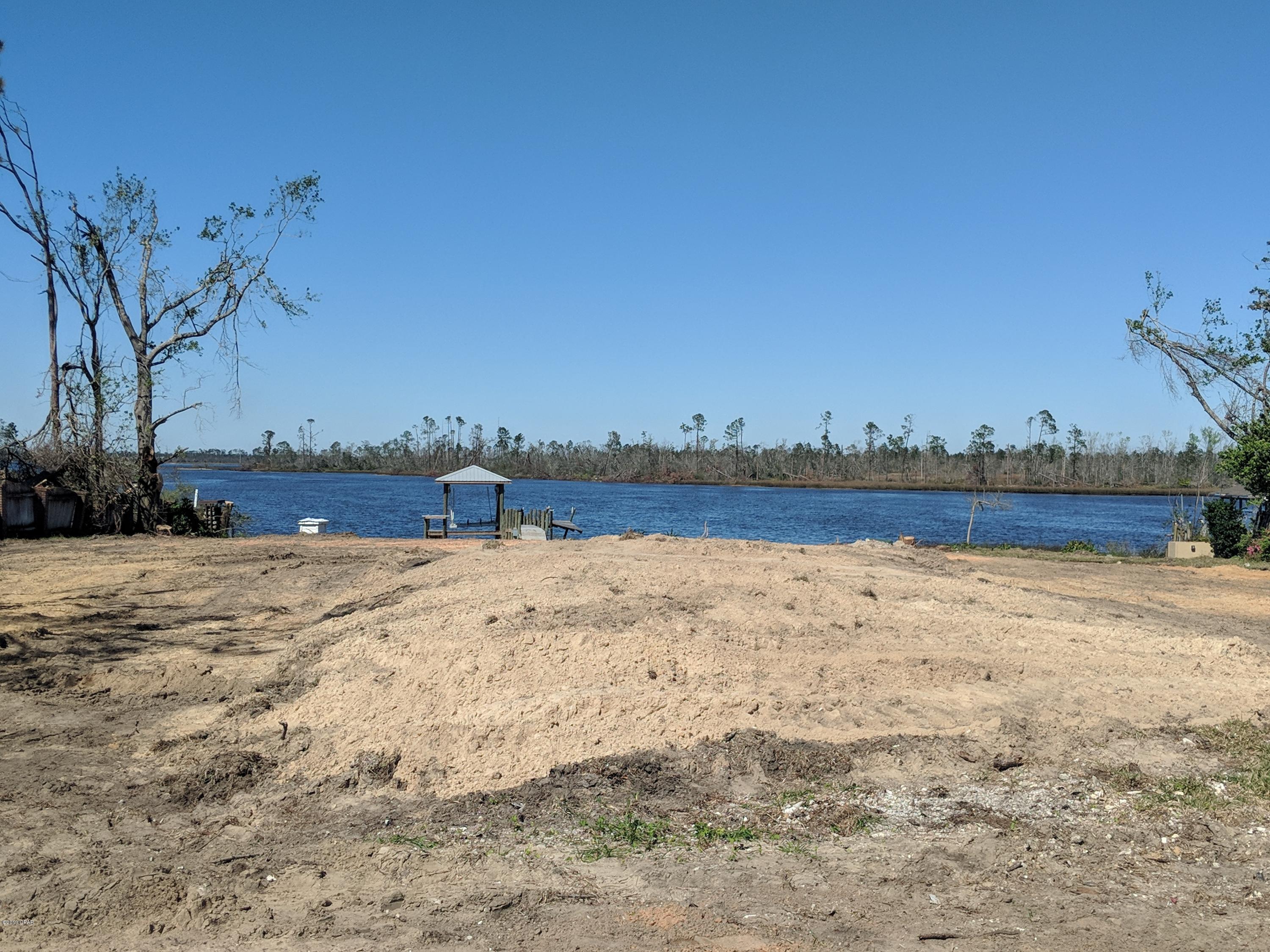 Beautiful waterfront lot on Mill Bayou, cleared, fill dirt already brought in and packed- ready to build! Boat house with boat lift and new sun platform.  Owner has decided not to build.  Have very suitable fully developed floor plan available for sale as well.  Agent has familial relationship. (Owner) Beautiful neighborhood peacefully nestled in College Point.