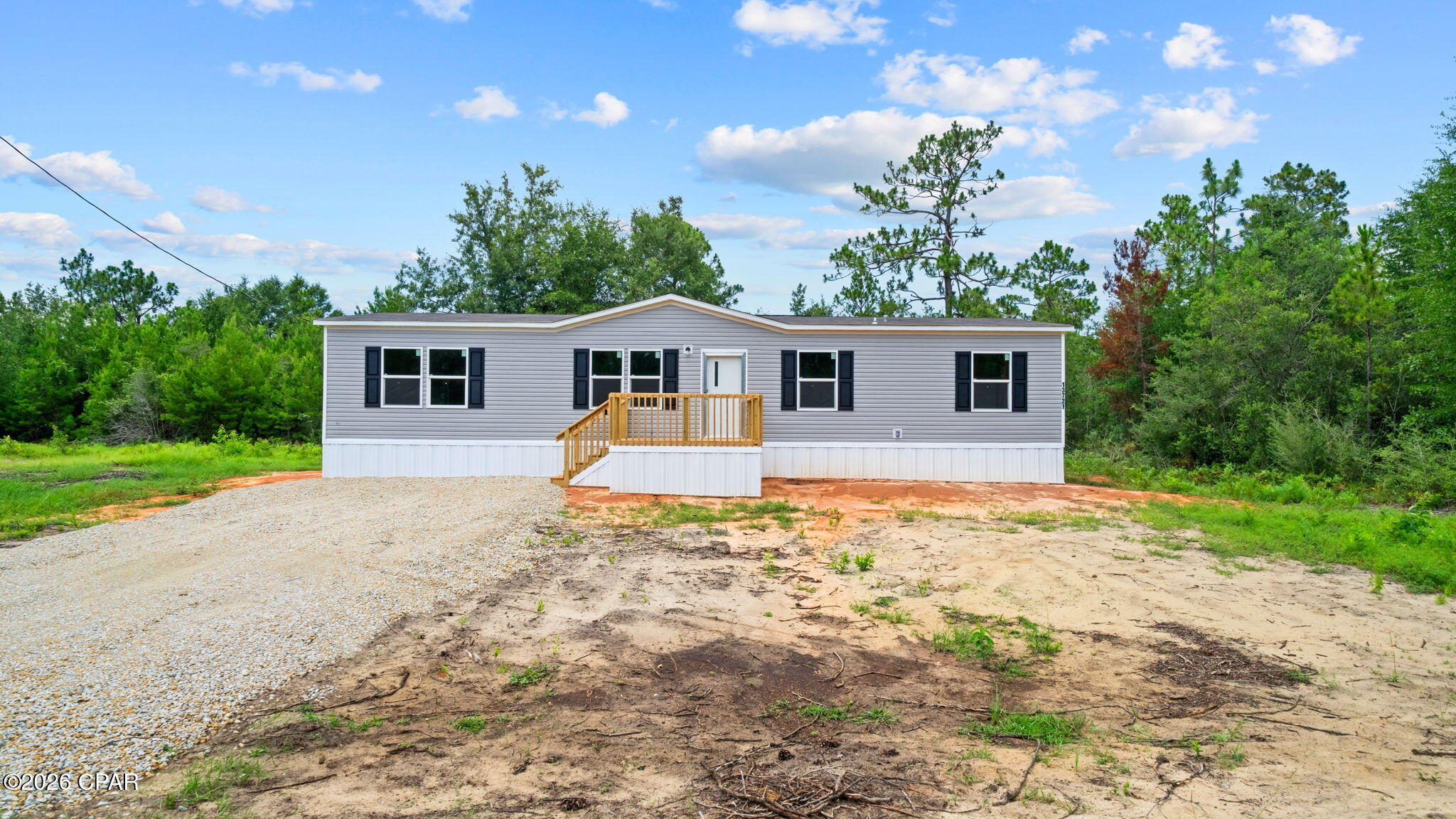 Brand-new manufactured home on a spacious homesite in Fountain, Florida! This move-in-ready property offers comfortable country living with plenty of room for a pole barn, workshop, detached garage, RV/boat parking, or additional storage.

Enjoy fresh air, privacy, and open space while remaining approximately 45 minutes from Panama City, Panama City Beach, Northwest Florida Beaches International Airport, shopping, grocery stores, restaurants, and medical facilities. Bay County has also begun paving roads within the neighborhood, adding accessibility and continued improvement to the area.

Whether you are purchasing your first home, downsizing, or looking for an affordable property with room to grow, this home offers a great combination of space, convenience, and peaceful rural living. Schedule your private showing today! ****All measurements and information is deemed reliable, and should be verified by buyer or buyer's agent if important.**