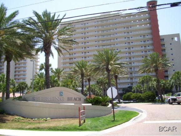 From the moment you drive into the front entrance at Sterling Beach you know you are Somewhere Special.  A winding driveway of paver stones lined with towering Royal Palms greets your arrival. Sterling Beach is second to none in our area in overall beauty of the grounds and amenities to the deluxe interiors of the units. This beautiful 3-Bedroom, 2-Bath BISCAYNE unit offers lots              Ten foot ceilings throughout along with lots of floor to ceiling glass open this unit up to plenty of natural light and the best of views. Extensive crown molding, built in surround sound, & large rooms all compliment this unit. The unit is being sold furnished and is ''Rental or Family Ready''  The master bedroom offers an oversized walkin closet and the master bath features raised double vanities, a Hollywood Bath, large Jacuzzi tub with a separate glass shower with bench seat. All the flooring in the unit is attractive plank which helps keep the unit clean.  The owner did some bathroom updating a few years back with some beautiful tile work.  The complex offers owners and guests high speed elevators, a huge free form tropical pool with plenty of deck space all done in designer pavers, an over sized 12-person hot-tub, gulf front fitness center, a large patio area with gas grills and tables, a beach front rinse and shower station, an activity room, and the beaches first theater, which is perfect for public and private movies, pay per view events, or business conferences and meetings.  There is also an onsite rental and HOA office for owner and visitor convenience..  Sterling Beach is in the central portion of Thomas Dr.  This makes it very convenient to  some of the areas leading restaurants, all the boat fleets including fishing, diving, and sight seeing.  St. Andrews State Park is also nearby right down Thomas Dr.