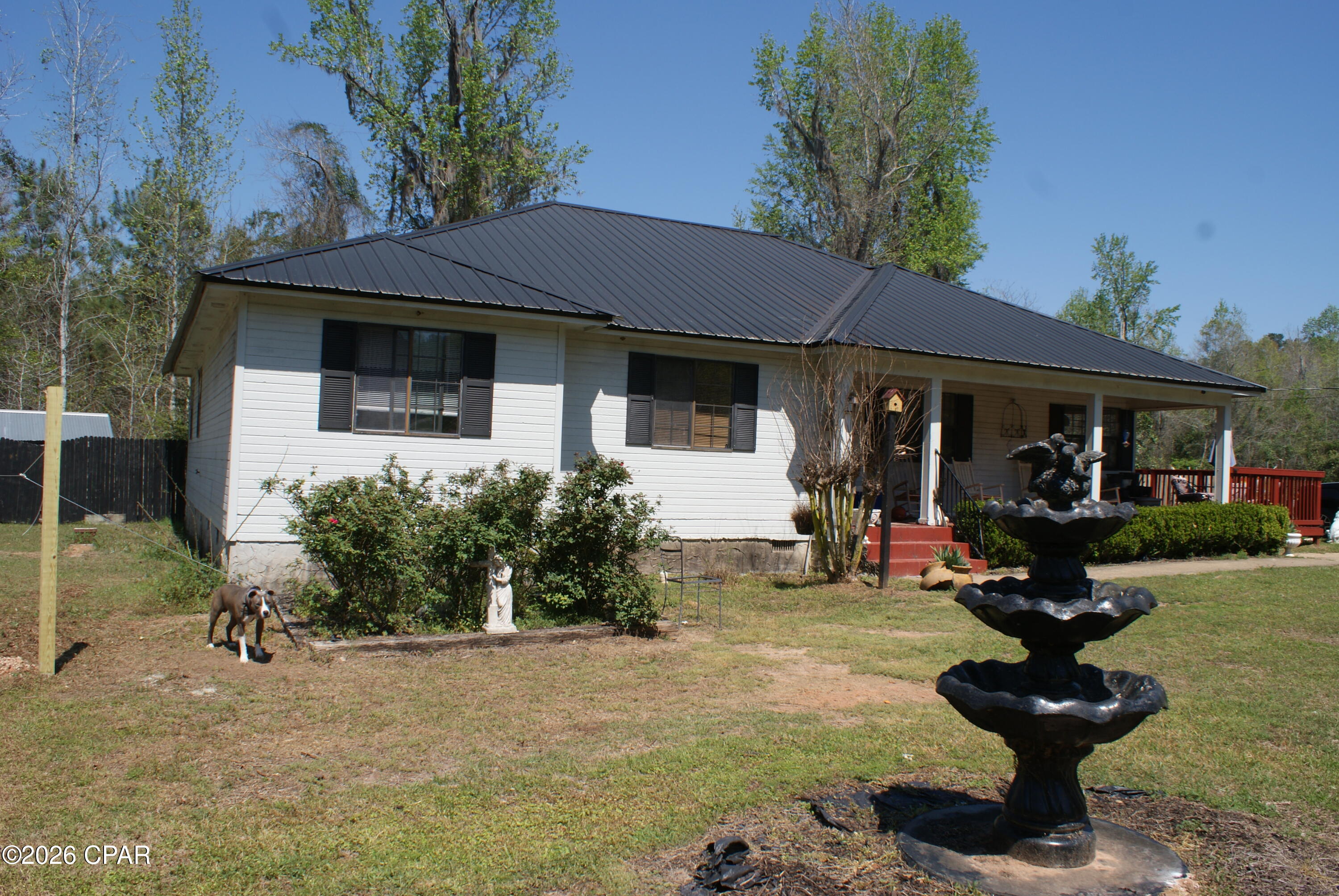 PRICE ADJUSTMENT!!! This beautiful home exudes with charm with architectural details including a welcoming front porch perfect for relaxing and absorbing the picturesque surroundings. The interior offers a blend of vintage character and modern features.  Located in a peaceful rural setting which provides for a perfect balance of serenity and accessibility. The home includes a cozy 1-bedroom basement complete with a full bathroom and kitchen. The basement includes a separate entrance which could provide rental income opportunities.  Hurry and make this charming cottage your own! 

Property is occupied by the owner so please schedule showings through Showing Time at a minimum of 24 hours in advance.