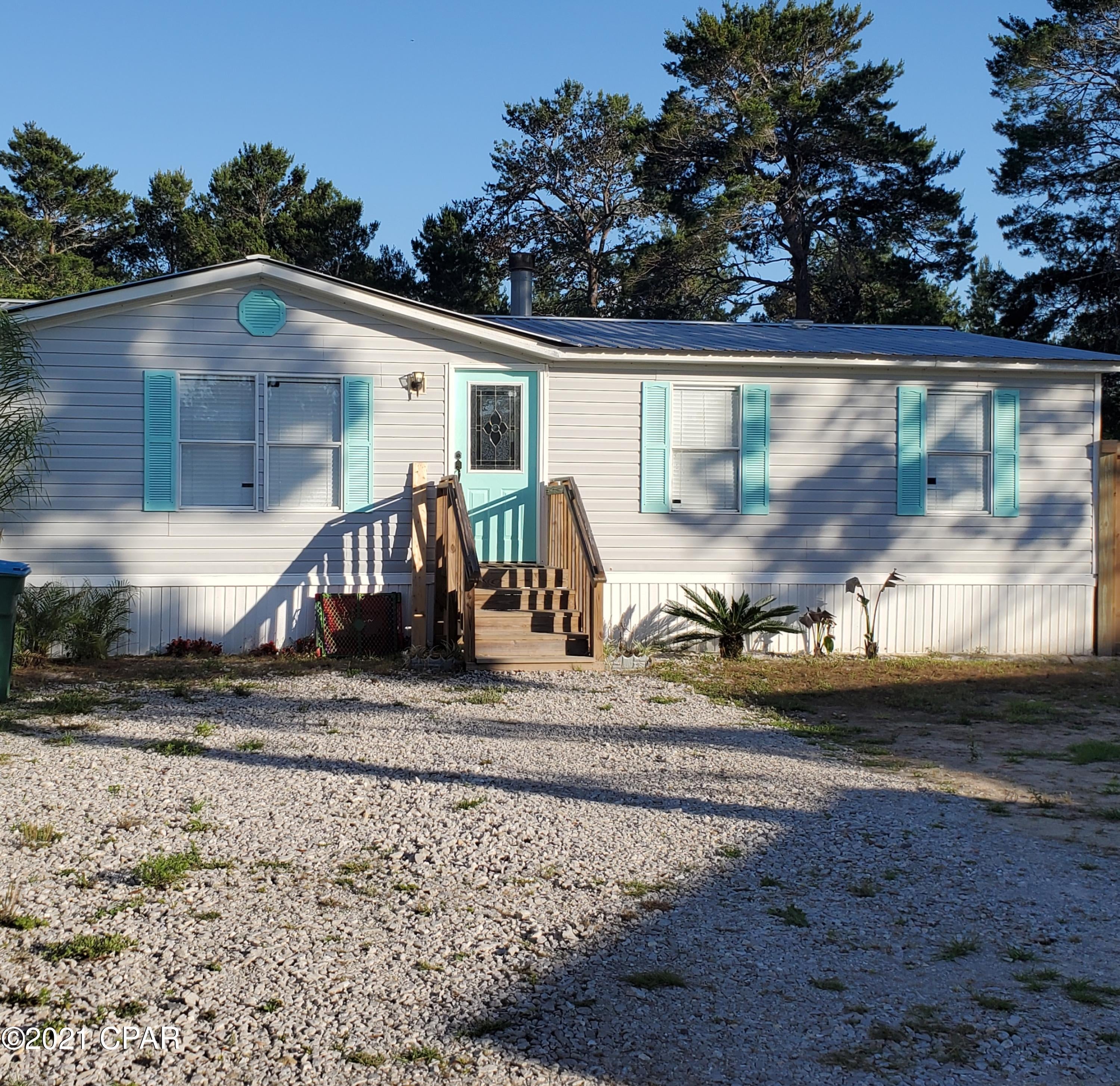 Beach living!

Welcome to Panama City Beach, and welcome home!

 Located close to shops but still quiet enough to be peaceful.

As soon as you step inside you will be greeted with a large open concept layout. Fully gutted and remodeled. Custom kitchen cabinets, functional fireplace in the dining room. Beautiful new floors and subfloors. 1/2 inch thick sheetrock throughout. Two bathrooms that have new tile in the showers.

Spacious bedrooms.

Large  laundry room right off the kitchen. Stepping outside into the back yard there are two covered porches and a tiki bar area for entertaining. 

And best of all, there is a She shed/ Man cave with full electric in the front yard! Owner will install partial privacy fence with acceptable offer. Home is occupied but set up a showing today! Seller will install 6 ft privacy fence on the right side of property when facing the home with acceptable offer.