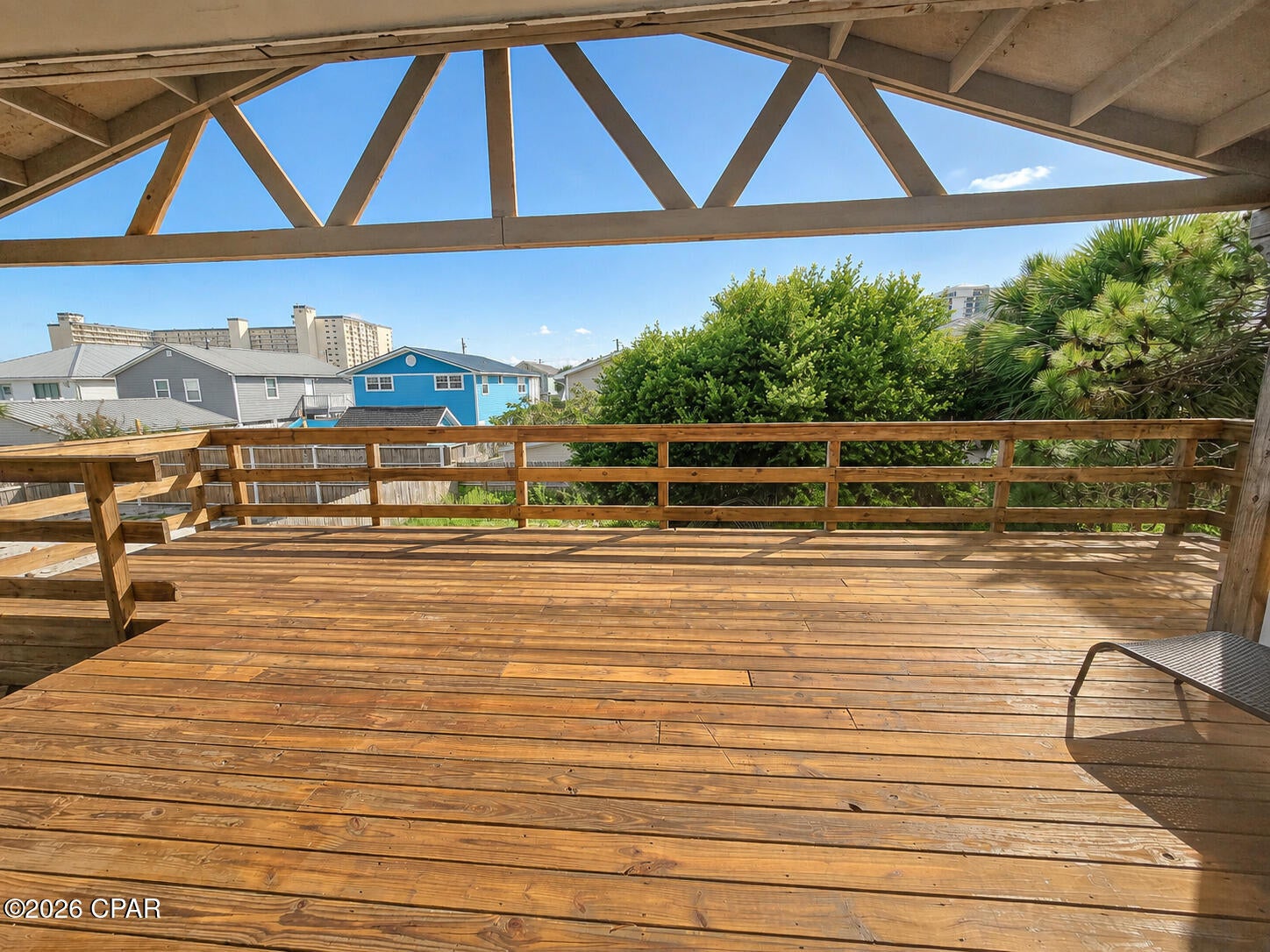 This is a must-see Panama City Beach rental offering privacy, space, and a location close to the beach. For the value, it is hard to find this combination of indoor comfort, outdoor living, and versatile storage/workspace.

Inside, the 2-bedroom, 2-bath home features an open kitchen and living area with granite countertops, dark wood cabinetry, stainless-steel appliances, a breakfast bar, and tile flooring. French doors lead to a large covered deck--perfect for relaxing outdoors or entertaining.

The spacious backyard offers a private outdoor setting, while the large garage/workshop provides exceptional room for parking, storage, hobbies, projects, or a dedicated work area. A separate laundry and utility area adds even more everyday convenience.

Enjoy the best of beachside living with room to spread out, practical storage, and a flexible workspace--all approximately 0.4 mile from public beach access, or about an 8 to 10 minute walk to the Gulf. This is a must-see home for anyone wanting privacy, a large backyard, and exceptional garage/workshop space this close to the beach. Schedule your showing today!