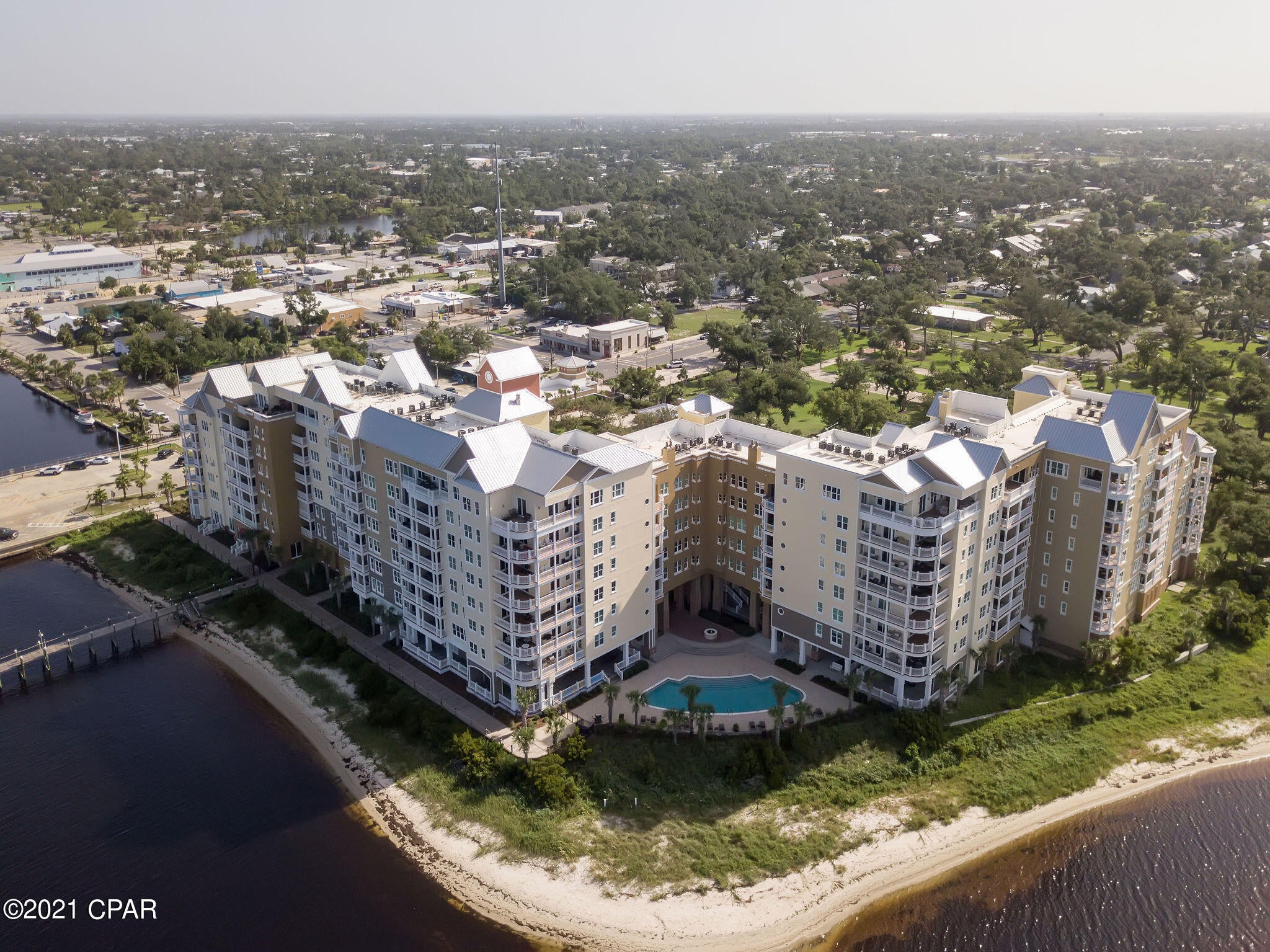 UNDER CONTRACT - Owner taking backup offers. St Andrews SUNSETS from this balcony that exceeds 200 sq ft will be your favorite room morning, noon, and night!  Watch dolphins swim under/around Harbour Village private marina.(Boat slip available for purchase)  Know what the catch of the day is as you have clear view of fishing boats as they unload at the end of the day.  Harbour Village is gated community with garden on top of the garage.  Outdoor fireplace, BBQ grills, and gazebo make outdoor entertaining easy.  Owners clubhouse with fully equipped kitchen, fireplace and spacious dining..  Harbour Village 203 has large kitchen and dining room with a view.  Large master bedroom with sliding door to balcony.  Plantation shutters, 10 ft ceilings, granite counter top Boat slip with lift and Marina Storage space available for purchase.  Don't miss this opportunity!  Short Notice Showings welcomed.
