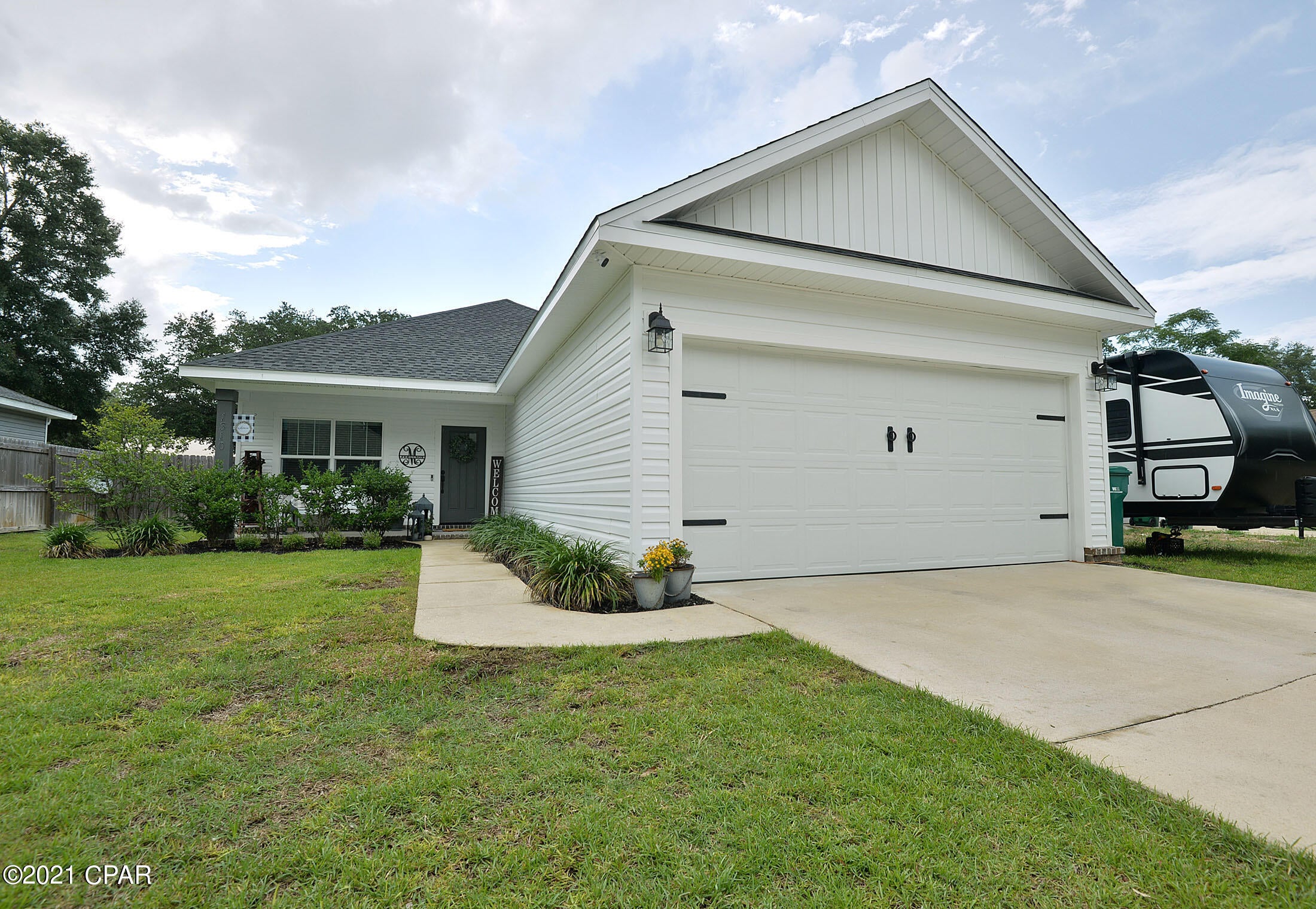 This home is a MUST SEE!! Parade of Homes Winner, with custom build features like 6'' baseboards, white shaker soft close cabinets and drawers, luxury vinyl plank throught the entire home, high impact glass windows, trey ceilings in practically every room in this home. Upgraded doors and windows give this home a touch of 30A feel and look! Quartz counter tops in the kitchen and all bathrooms certainly finish the beautiful decor of this truly one of a kind home. Outside of the home boasts a FULL 2 car garage, sprinkler system, privacy fence and PRIVATE inground pool. The Sellers also had Solar Panels installed and this home and is AMAZINGLY energy productive and efficient!L ocated a few blocks from the Marina and Docks as well as great shopping, dining and #1 rated schools in Florida.See NO