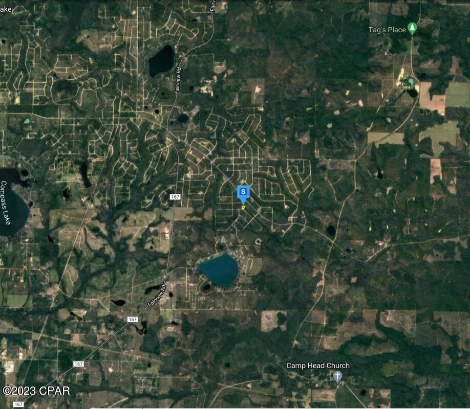 This 1.4 acre wooded lot in Compass Hills, Marianna, FL is the perfect opportunity to build your dream home in a secluded and natural setting. This lot is located near two beautiful lakes, providing endless opportunities for outdoor activities such as fishing, swimming, and boating. Enjoy the tranquility of nature and the peace of mind that comes with owning property in this desirable neighborhood.  Don't miss out on this great deal, make it yours today and enjoy the access to the two lakes!