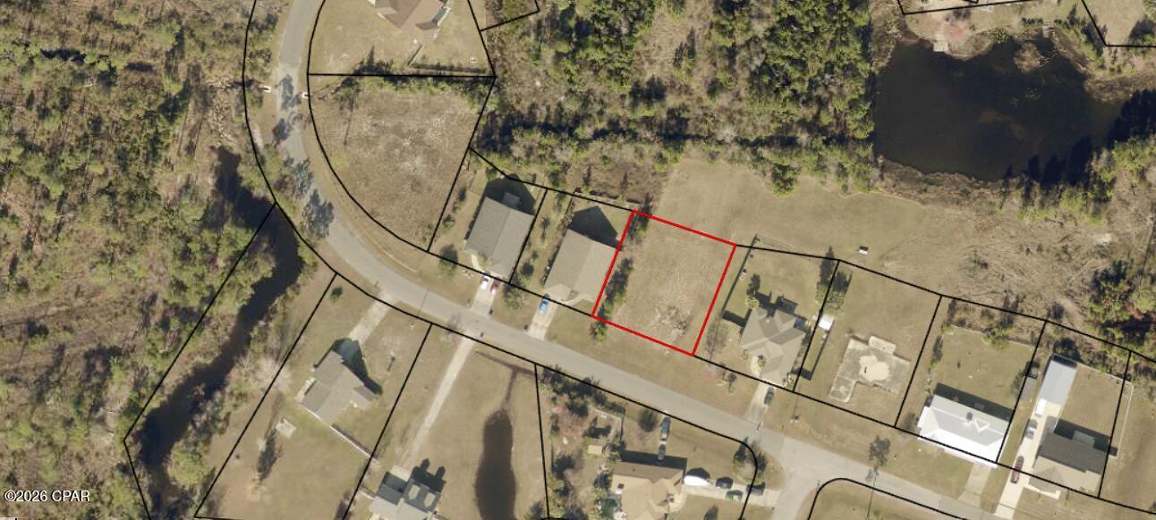 Build your new home on this approximately 0.247-acre vacant lot located on Country Club Drive in the Sandy Creek Country Club community. The generous lot size offers flexibility when planning your future home and outdoor living space. Conveniently situated within an easy drive of Tyndall Air Force Base, shopping, dining, schools, and everyday necessities. Whether you are ready to begin building or looking to secure property for the future, this lot offers an excellent opportunity to own land in Panama City. Buyer to verify all measurements, utilities, building requirements, and restrictions.