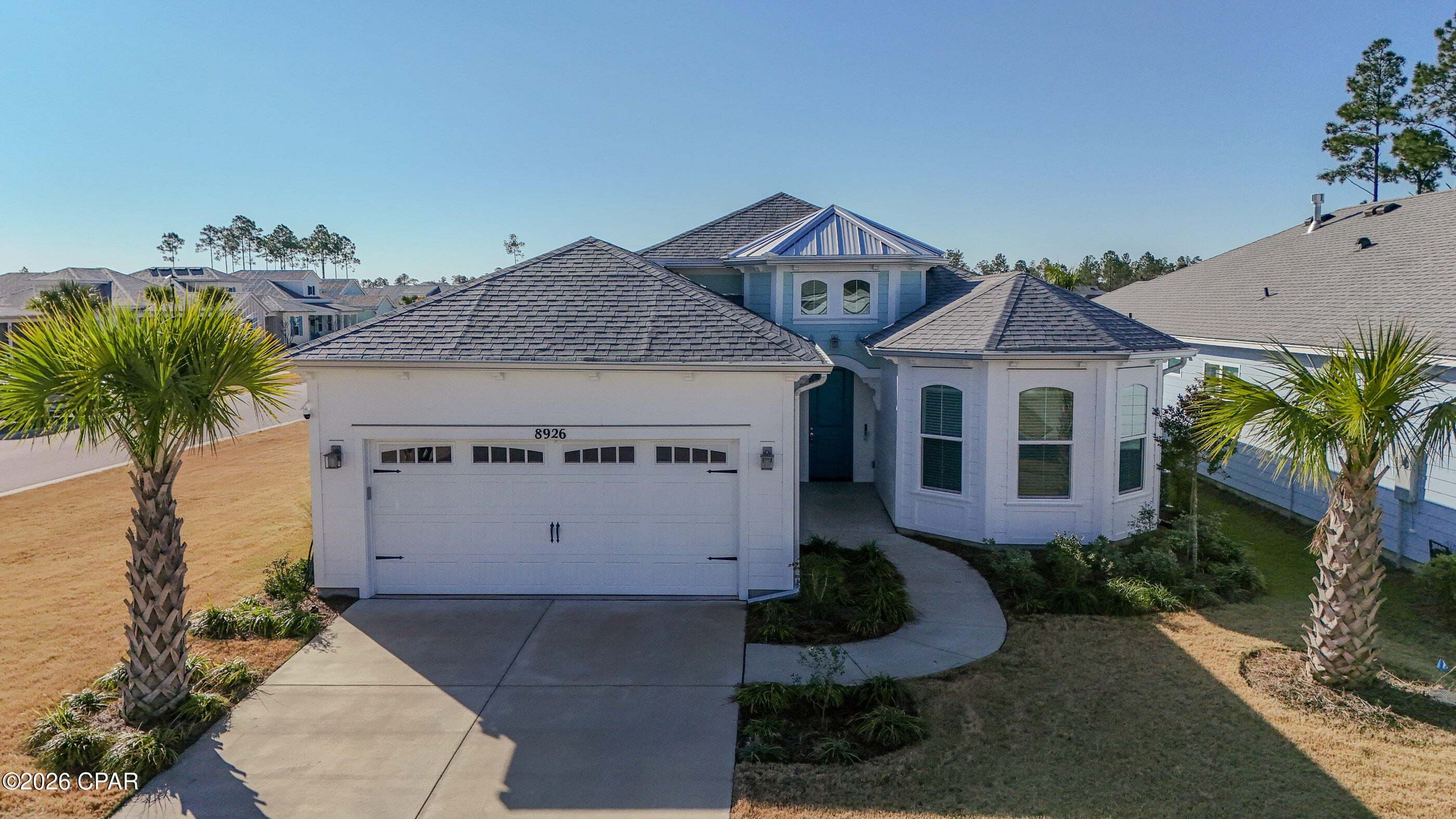 *CURRENTLY UNDER CONTRACT, SELLER WILL CONSIDER BACKUP OFFERS*
Welcome to this beautiful Parrot floor plan located in the highly desirable Latitude Margaritaville Watersound 55+ community. This vibrant, welcoming lifestyle is designed for those who want more than just a home.

This spacious home offers 2 bedrooms, 2 bathrooms, and a versatile flex room ideal for a home office, gym, or hobby space and an extra room off of the kitchen that can be used for a formal dining area, or customize the room however you want! One of the standout features is the extended screened-in porch, expanded by an additional 10 feet to create an oversized outdoor living area--perfect for morning coffee, entertaining guests, or unwinding after a day at the beach.

Inside, the home is enhanced with custom curtains throughout and remote-controlled blinds, offering both style and convenience while maximizing natural light and privacy. Enjoy a spacious primary suite featuring separate his-and-hers closets and a beautifully appointed en-suite bathroom with an oversized walk-in shower. There is also a full-house water filtration system adds everyday comfort and peace of mind, and a brand-new golf cart (conveying with the sale) makes getting around the community effortless and fun.

With over $50,000 in upgrades, plus a brand-new golf cart, this home is truly move-in ready and offers exceptional value beyond standard builder features.

Living in Latitude Margaritaville Watersound means enjoying a resort-style, active lifestyle with amenities that include multiple pools, including an island-style pool overlooking the Intracoastal Waterway, a state-of-the-art fitness center, pickleball and tennis courts, walking and biking trails, social clubs, and a lively Town Center with daily live music and events.

HOA fees include landscaping and lawn care, allowing for low-maintenance living.

Residents also enjoy a two-story full-service bar and restaurant, daily live music, a dog park, woodworking shop, ceramic studio, theater, and golf-cart-friendly streets throughout the community. A future commercial area is planned to include a Publix grocery store, dining, shopping, and a public marina, adding even more convenience and value.

Ideally located near the West Bay corridor, this home is approximately 10 minutes from Northwest Florida Beaches International Airport, 7-10 miles from the white-sand beaches, and close to shopping and entertainment. The community is also near medical facilities, with a hospital currently under construction and expected to be completed in 2027.

Skip the construction wait and step directly into a move-in-ready home where upgrades, comfort, and lifestyle come together. It's time to embrace the Margaritaville way of life!