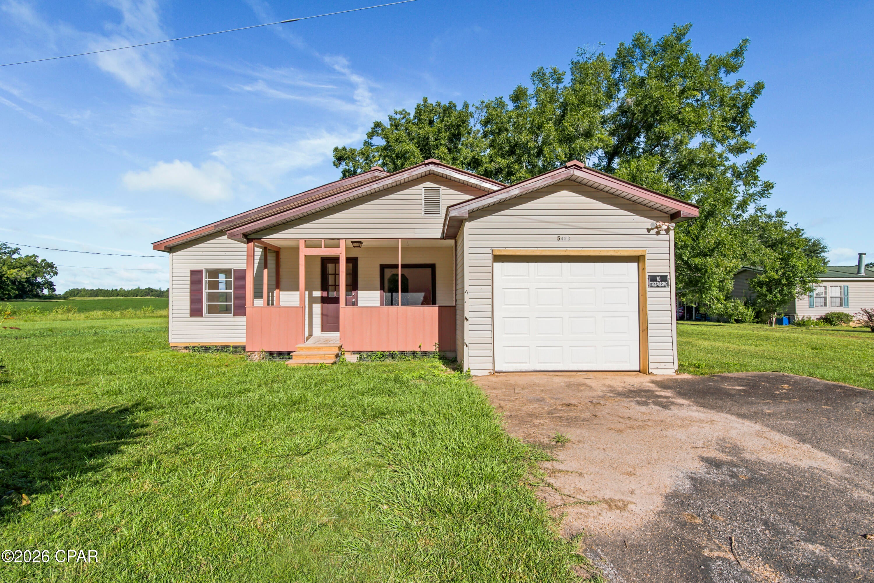 Welcome to 5493 Ellaville Road, Campbellton, Florida 32426, a move-in ready 2-bedroom, 1-bath home situated on a spacious 0.55-acre lot with NO HOA. The home features a functional layout with an additional office/living space, 1-car garage, and plenty of outdoor space. Recent improvements include new flooring, fresh interior paint, new range, new water heater, a new garage door, and more, offering a clean and refreshed interior ready for its new owner. The spacious lot provides room for outdoor activities, gardening, storage, or future improvements without HOA restrictions. Located in Campbellton, this property offers the opportunity to enjoy a quieter setting while remaining within convenient reach of surrounding communities and local amenities. 5493 Ellaville Road is an excellent opportunity for buyers seeking a move-in ready home, acreage, a garage, and the flexibility of NO HOA. Call and schedule your showing today.
