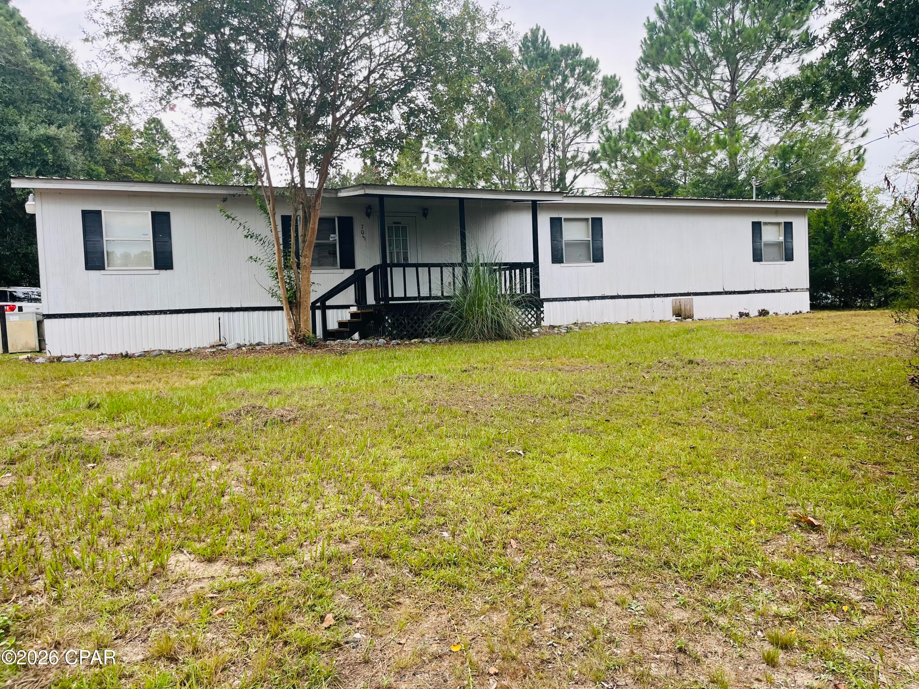 Positioned on approximately 1+/- acre along the high-traffic Highway 90 corridor in Holmes County, this property offers an excellent opportunity for an investor, entrepreneur, or business owner looking to bring a commercial vision to life. Formerly home to The Look salon, the property features an existing commercial building that provides a solid starting point for revitalization.

With some TLC and creative vision, this property could be transformed into a variety of commercial uses, from a salon or professional office to a retail storefront, service-based business, or other entrepreneurial venture. The spacious 1+/- acre site offers valuable room for parking, expansion, or additional improvements.