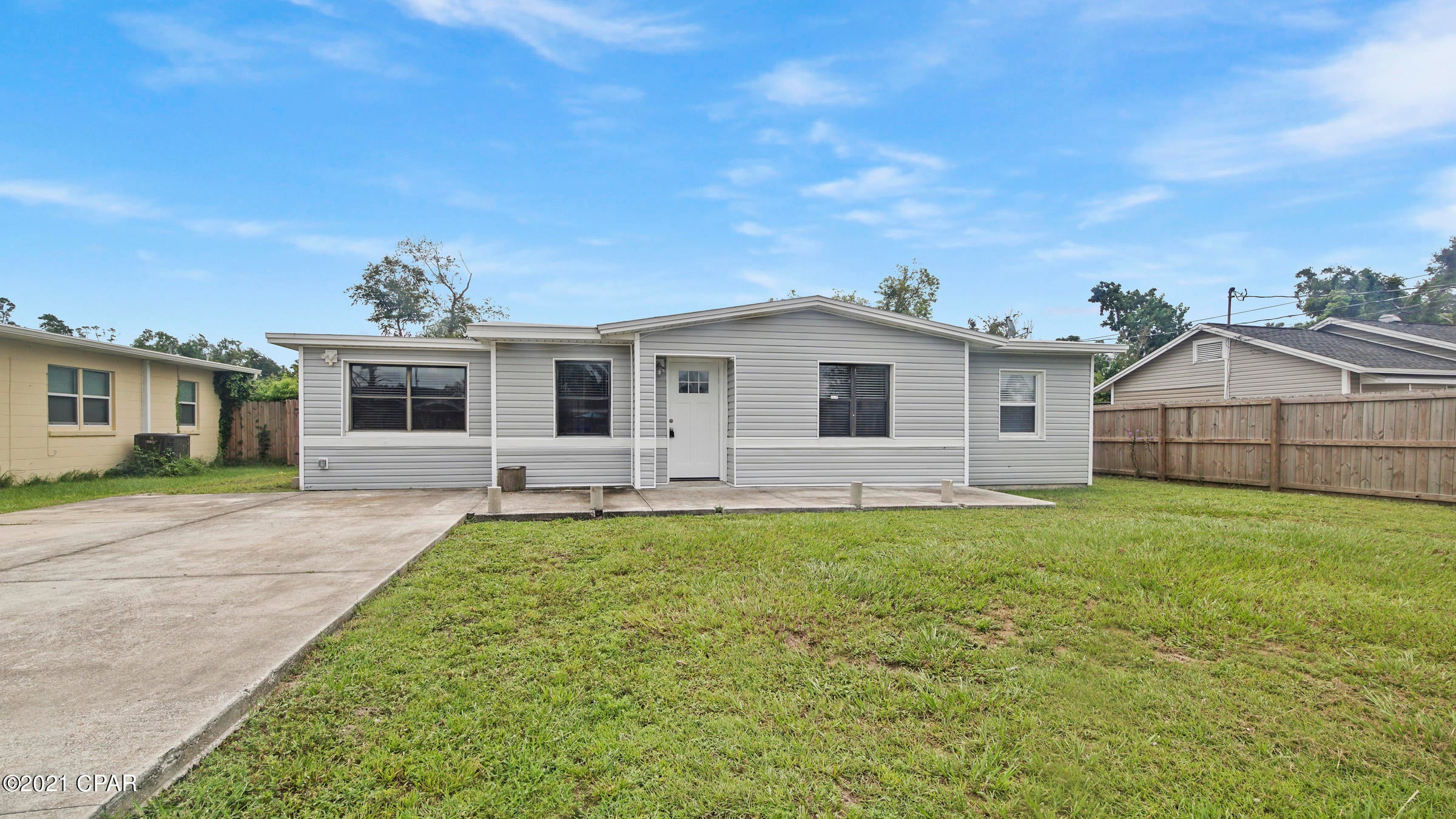 CURRENTLY UNDER CONTRACT, SELLER ACCEPTING BACKUP OFFERS Cute well taken care of home centrally located & close to Panama City Beach & Golf Coast State College. New roof 2019, new HVAC 2016 & newer stainless steel appliances. Many updates in this home! You'll love the tile/laminate floors & spaciousness of this house. The two living rooms & huge kitchen are sure to impress. There's even a fourth room that could be used as an office or 4th bedroom & has a storage closet attached. The main bedroom features an attached bathroom w/walk-in shower & huge walk-in closet. The two other rooms are spacious & have nice closet space. Outside features a nice covered patio, large storage shed & fully fenced large back yard.