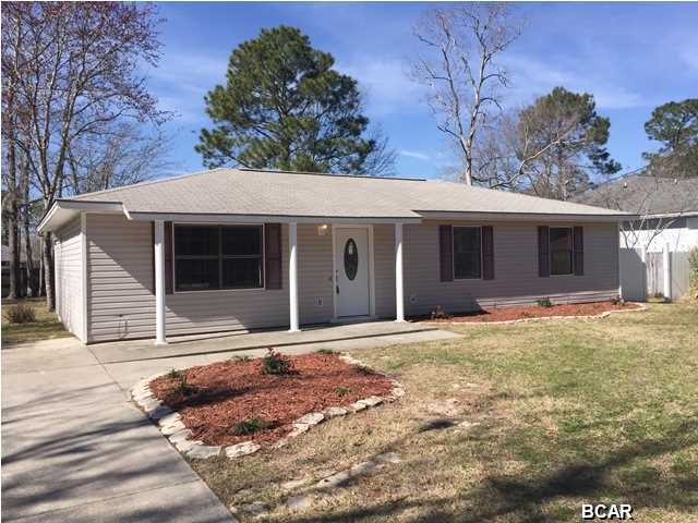 Cute home in Lynn Haven! Nice open and flowing floor plan. The home has a large living room, good sized dining area and a nice galley kitchen with new appliances! The whole house is tile, there is a new air conditioning system. The interior of the home has been freshly painted. The separate laundry room has a door leading out to the large fenced back yard. The water heater and air conditioner are also brand new! This home is ready for a new family!