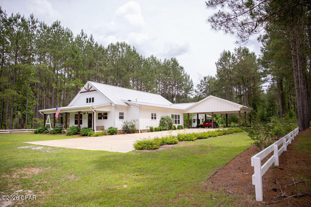 3379 Acy Rd is a secluded homestead situated on 38 acres in Vernon, Florida. The property includes a 2-bedroom, 2.5-bath home and a 2,500-squarefoot pole barn/workshop suitable for equipment, storage, or projects. The land features two small ponds, 17-year-old loblolly pines, and abundant wildlife. With a mix of open and wooded acreage, the property offers privacy, usable land, and multiple options for agricultural, recreational, or residential uses.