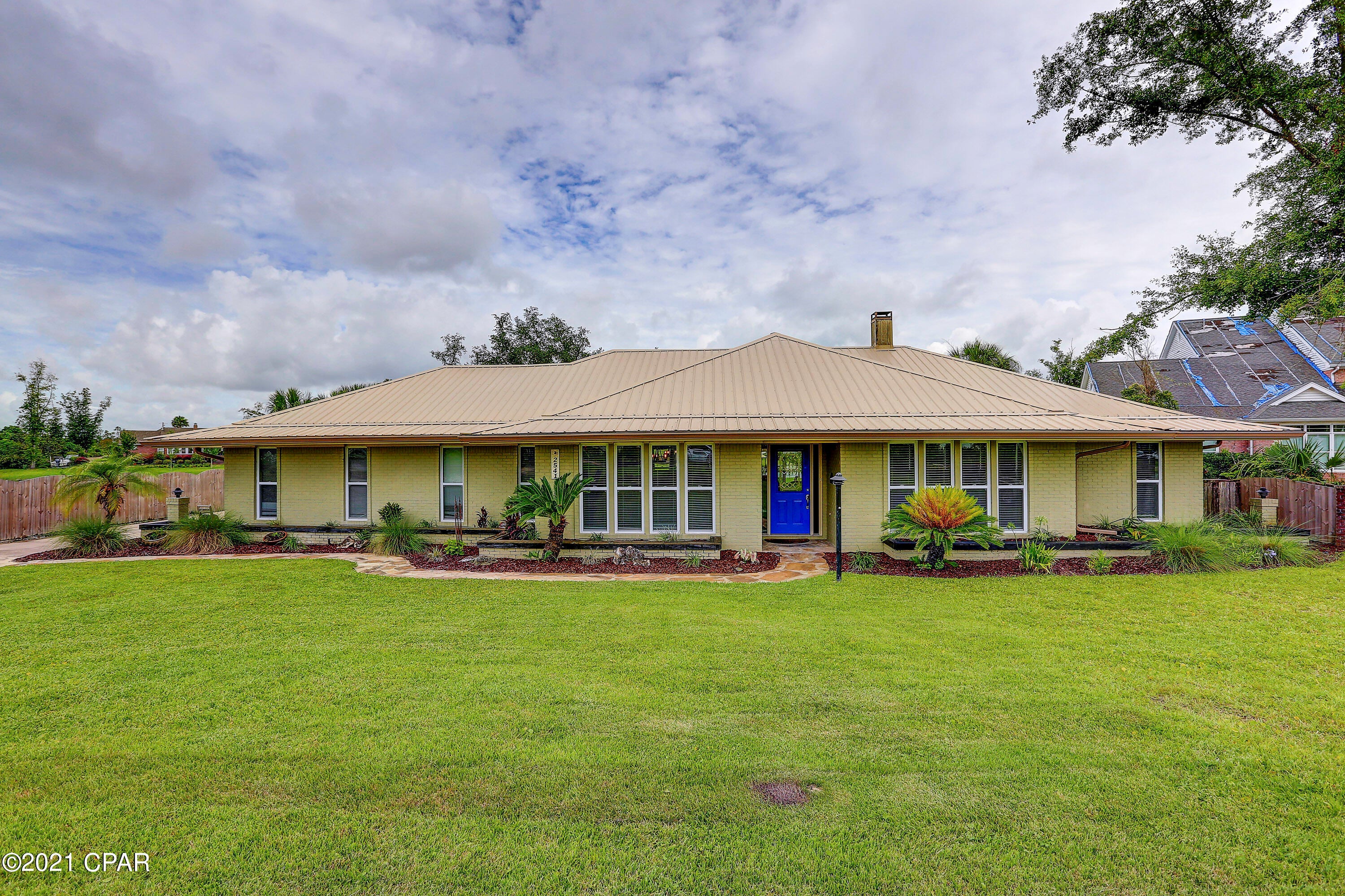 Waterfront Living in this 5 bedroom 2 bath College Point home.  Located on Mill Bayou with over 150 feet of water frontage, the views are spectacular.  Highlights of the home are open floor plan, gas fireplace, all new windows and sliding doors, 2016 metal roof, 2019 AC, formal dining room, granite countertops, stainless appliances, gas stove, laminate floors in main living areas, and split floor plan.  Out back you have wonderful areas to entertain: deck with bar, fire pit, gas grill connected to natural gas, large pool, boat house with 10,000 lb boat lift.  The canal is dredged to 6 ft in the middle. The house is on well and septic.  There is a water softener, new Hayward pool pump and new Polaris cleaner.  The pool has new tile and there is a gas heater that  has been disconnected but can be hooked up again.  House is Flood X, but sellers have a transferable flood policy that is currently $572 per year.  The 5th bedroom is currently being used as a den.  The lot is 3/4 of an acre. 30 minutes to Shell Island by boat.  Make your appointment to view this beautiful home today!