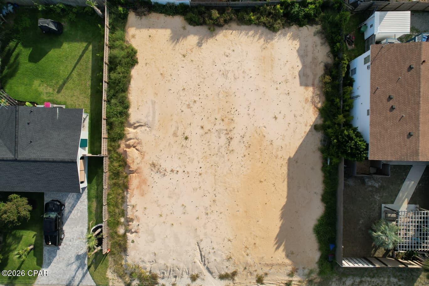 Discover an exceptional opportunity to own a prime 0.25 acre double lot at 5615 Beach Dr, Panama City Beach, FL 32408, offering approximately 10,977 square feet in one of the area's most desirable beachside locations. This cleared, filled, level, and build-ready property is ready for your custom coastal home or investment project.

Ideally situated just steps from the beach, this property provides clear Gulf views with no condos or high-rise buildings directly in front, allowing you to enjoy the beauty of the coastline. Public sewer and water are available, the property is located in an X Flood Zone, and there is no HOA, providing added flexibility for your future plans.

Enjoy the convenience of being close to a public boat ramp, shopping, restaurants, fishing, and a wide variety of beach and water sports. Whether you're boating, paddleboarding, jet skiing, or spending the day on the sugar-white sand beaches, this location offers the best of the Panama City Beach lifestyle.

With endless possibilities for new construction, this established neighborhood is the perfect place to build your dream beach home with a pool, boat parking, and outdoor entertaining areas, or create an outstanding investment property in a highly sought-after location.

Don't miss this rare opportunity to own a build-ready double lot in an outstanding location.