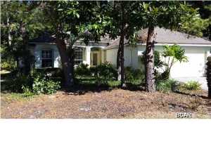 Natural Florida charm abounds in a peaceful, undisturbed setting! This contemporary styled home backs up to the Preserve across from Bay Point. The split floor plan has raised ceilings, beautiful hardwood floors in the main area and large neutral tile in the kitchen and bathrooms. The open floor plan includes a generous sized kitchen with a large dining area and a huge heated and cooled sunroom. The kitchen has Corian countertops. The gas fireplace in the center of the great room gives warmth and ambiance to the entire main living area. The 14x20 heated and cooled sunroom overlooks the lush, tropical setting of the backyard. The huge laundry room/mud room comes well equipped with a deep sink and lots of cabinets. And it's perfectly located next to the master suite! The master