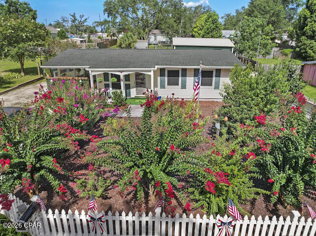 Charming Florida Cottage in the Highly Sought-After Cove! This beautifully maintained 2-bedroom, 1.5-bath home showcases exceptional pride of ownership and is move-in ready. Major updates include a newer HVAC system, a 2018 roof with a 50-year shingle, new windows installed in 2019, a tankless water heater, and a stunning Bath Fitter walk-in shower installed in 2017. The home also features quality carpeting with premium padding for added comfort, and a quality tile.

Step outside to your private backyard oasis, where you'll enjoy a beautiful covered back porch overlooking a meticulously maintained lawn, mature shade trees, and fruit trees. The property includes a 275-gallon irrigation system to keep the landscaping lush, a commercial-grade 6-foot privacy fence, a termite bond with a local company, a spacious 20' x 25' detached shed/workshop with the potential to serve as a garage, and an additional 10' x 12' storage shed. The concrete driveway was poured within the last 10 years, adding to the home's long list of improvements.

Conveniently located in one of Panama City's most desirable neighborhoods, this charming cottage is just minutes from downtown, shopping, dining, schools, parks, and the beautiful St. Andrews Bay. Schedule your private showing today and discover why life on the Florida Coast is calling! All measurements are approximate and should be verified by buyer.