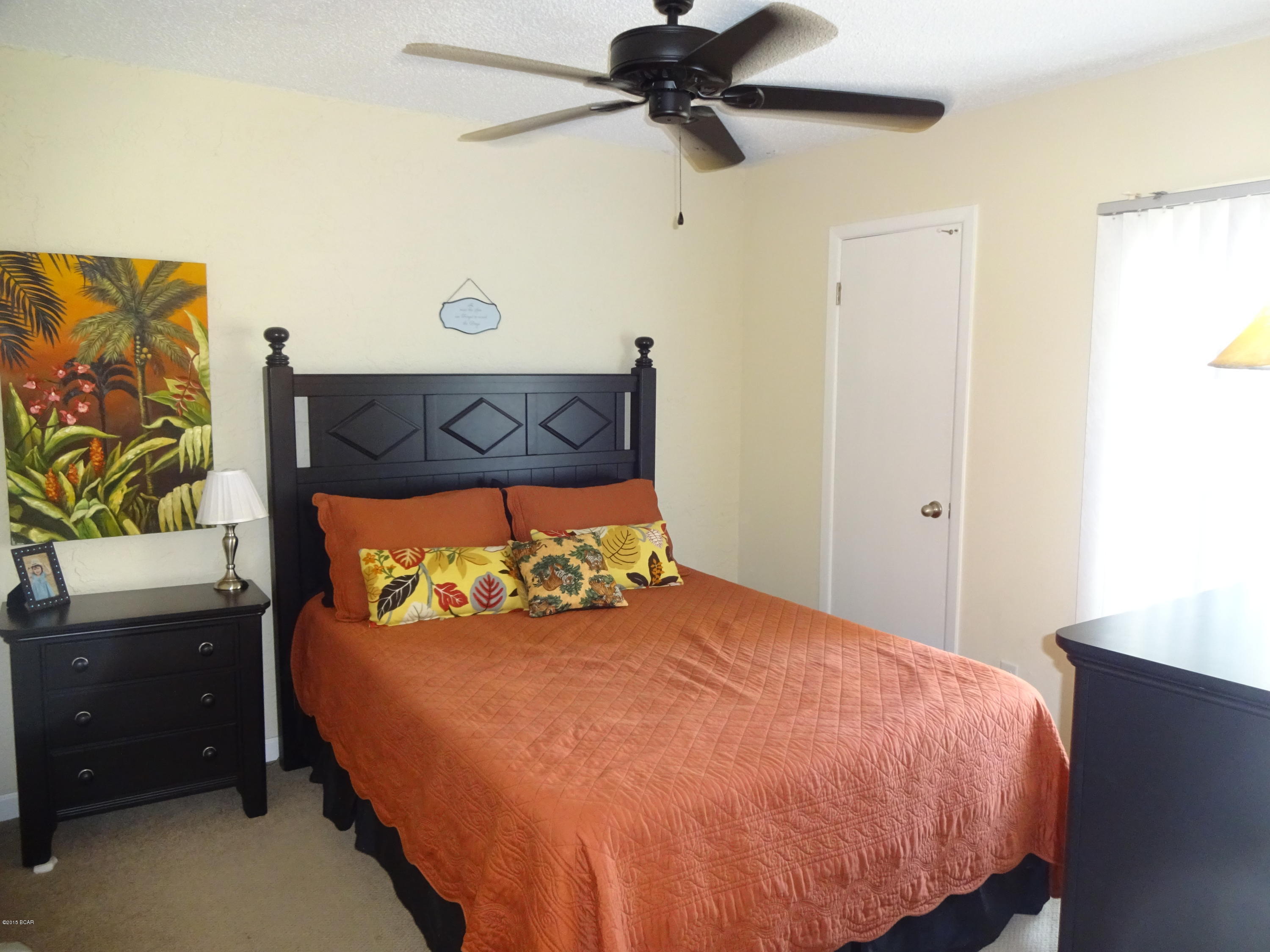 The complete interior has been recently remodeled with all new tile downstairs and w/w carpet upstairs. Furnishings have been very nicely updated throughout with a warm and comfortable motif. New kitchen and baths. Ceiling fans throughout. Wonderful gulf views from both balconies. Sugar Beach is a gulf front,  low-rise, pet friendly complex that is  very popular with families. Within walking distance to dining, entertainment, shopping and amusement venues. Park right at your front door. Great investment opportunity. This one is a must see.