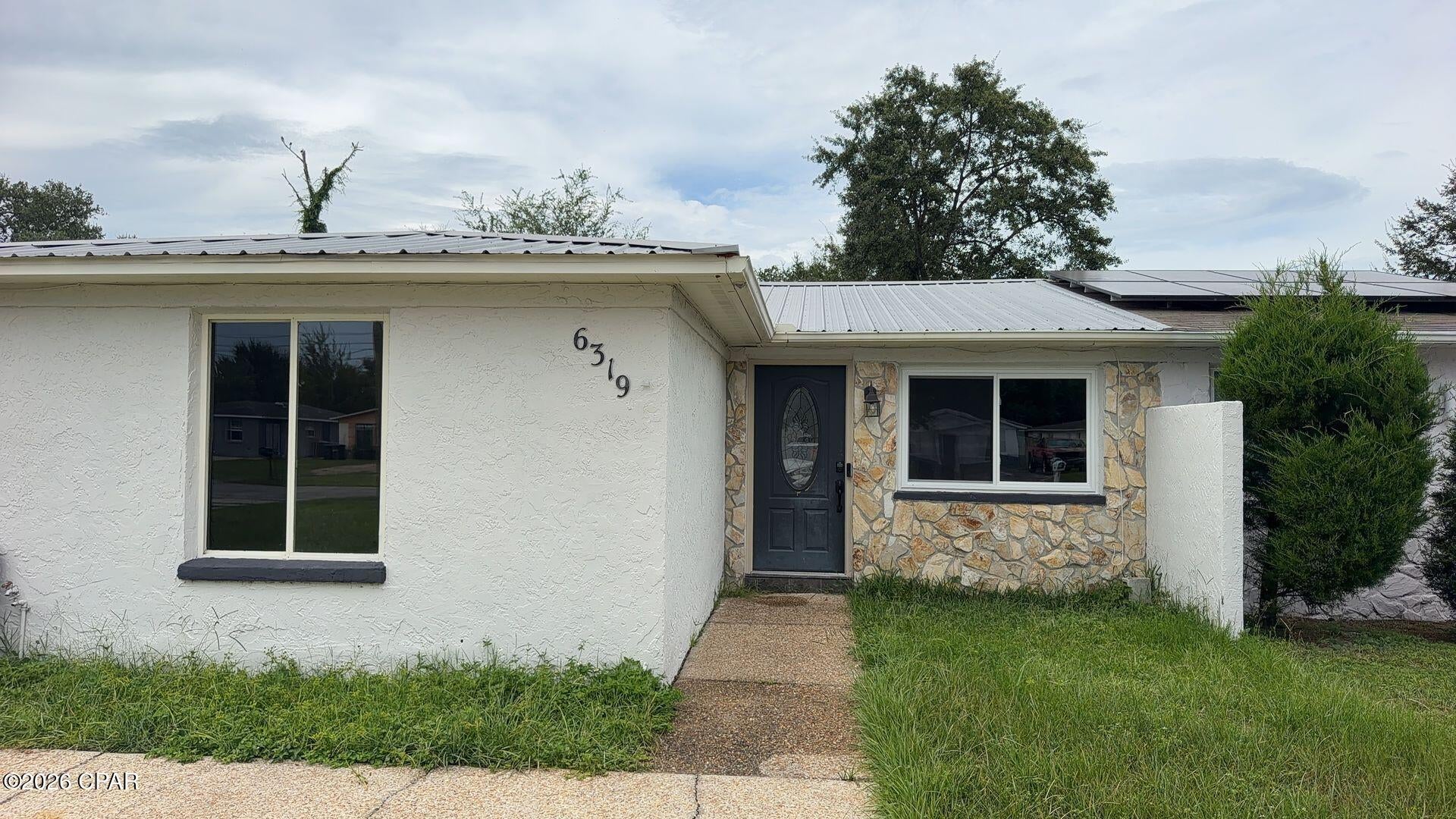 Available Now! Spacious 3-bedroom, 2-bath duplex centrally located in Callaway near shopping, dining, and Tyndall Air Force Base. This unit features a large living area, separate dining room, and a kitchen with stainless steel appliances. The spacious master suite offers plenty of room, while French doors lead to a private, fenced-in backyard with a storage shed. The driveway provides ample parking. Pet allowed with owner approval.