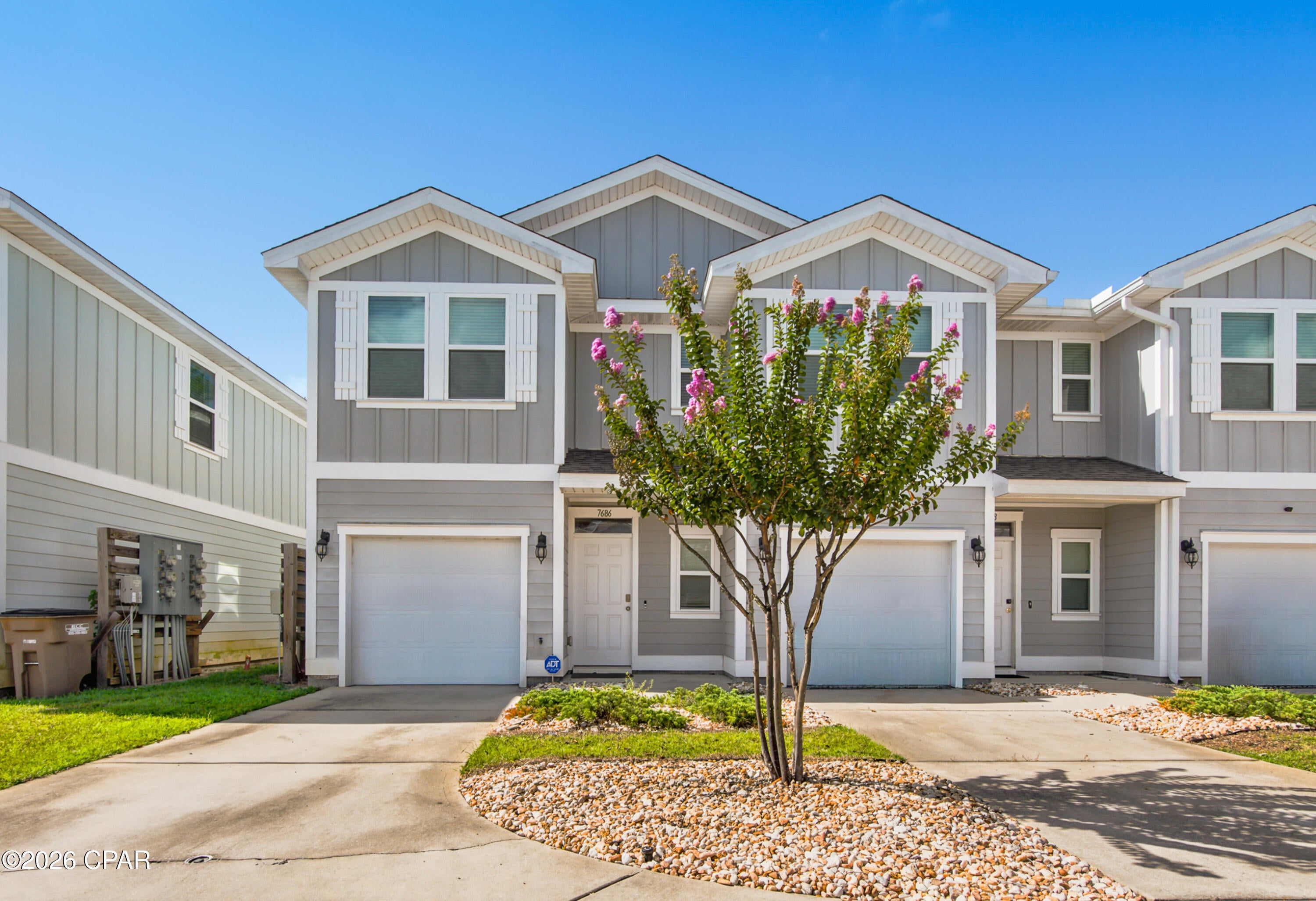 Welcome to Hathaway Townhomes! This 3-bedroom, 2.5-bath townhome offers a convenient Panama City Beach location with short-term rentals allowed. The home features vinyl plank flooring throughout the main living areas, designer-style lighting, nickel-finish hardware, and carpeted bedrooms. The kitchen comes equipped with a smooth-top range, microwave, and dishwasher and opens to the main living area for an easy, functional layout. Upstairs, you'll find all three bedrooms. Two guest bedrooms share a full bath featuring a granite countertop and tub/shower combination. The spacious primary suite includes a walk-in closet, double vanity with granite countertops, and tiled walk-in shower. Additional features include a one-car garage and smart-home technology. Hathaway Townhomes offers a community pool and attractive lake views, with the pool just a short walk from the home.
Conveniently located near the beach, Naval Support Activity Panama City, Highway 98, Publix Sports Park, shopping, dining, Pier Park, and many of Panama City Beach's popular attractions. All measurements and information are deemed reliable but should be verified by the buyer if important.