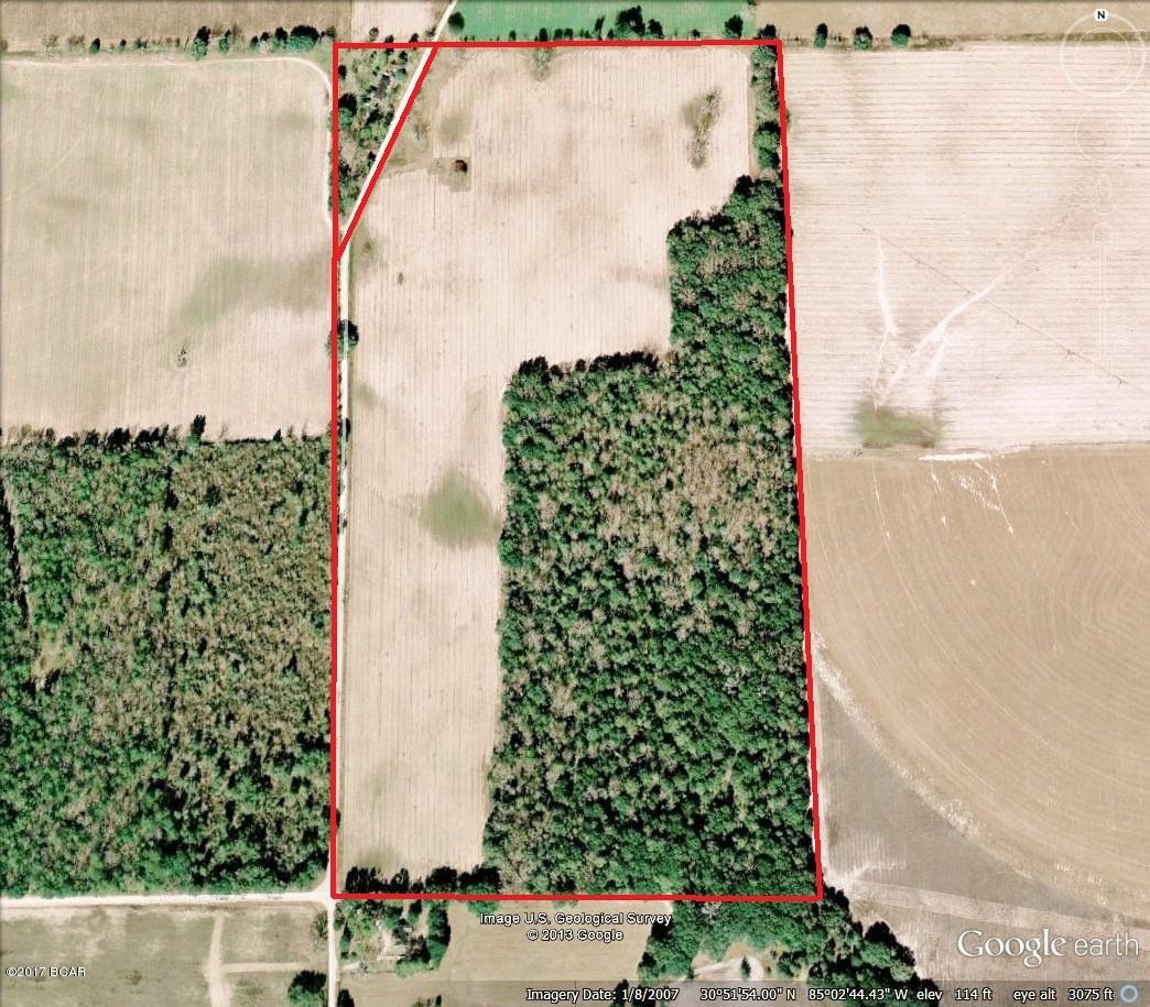 76 ACRES, apprx 38 acres in Rowcrop farmland and balance in big hardwoods. Farm land is currently leased for farming and crops will be honored until harvest. Currently planted in peanuts. Soils mainly consist of Blanton Course Sand which is great for grasses if you wanted pasture. Most of the property is fenced but may need some repair. Property could be cleared and irrigation added if desired. Many possibilities but one thing for sure, It is hard to beat the Country Life