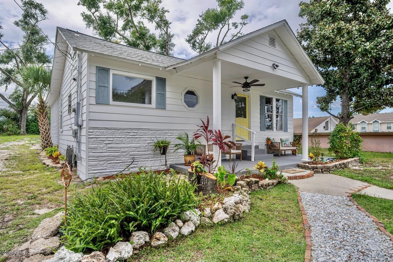'CURRENTLY UNDER CONTRACT, SELLER ACCEPTING BACKUP OFFERS' You have to see this fully furnished Florida Cottage located within walking distance to Historic St Andrews. You'll love the tranquility of this community and all it has to offer including desirable dining, marina, shops and entertainment. Whether you're looking for a private residence or a great rental long term or AirBnb this home is a must see! With 3 bedrooms, plenty of entertaining spaces and a large yard you'll enjoy spending time with family and friends. Highlights include a new roof installed in 2019, Hardwood flooring throughout the home, shiplap ceilings, front porch for relaxing and a back patio for entertaining, storage building. You'll love the spacious kitchen with updated countertops, plenty of cabinets for storage and a kitchen island. Call today to schedule your private showing.
